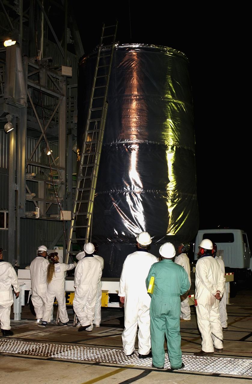 KENNEDY SPACE CENTER, FLA. -- In the early morning, the Comet Nucleus Tour (CONTOUR) spacecraft arrives at Launch Complex 17-A, Cape Canaveral Air Force Station, from the Spacecraft Assembly and Encapsulation Facility 2 (SAEF-2). CONTOUR will provide the first detailed look into the heart of a comet -- the nucleus. Flying as close as 60 miles (100 kilometers) to at least two comets, the spacecraft will take the sharpest pictures yet of a nucleus while analyzing the gas and dust that surround these rocky, icy building blocks of the solar system. Launch of CONTOUR aboard a Boeing Delta II rocket is scheduled for July 1, 2002