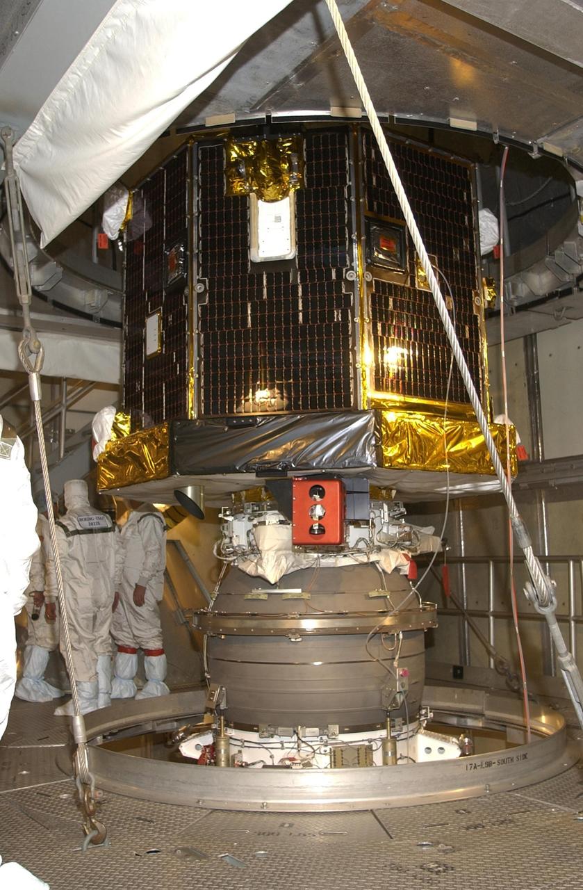 KENNEDY SPACE CENTER, FLA. -- With the container removed, the Comet Nucleus Tour (CONTOUR) spacecraft is ready for fairing encapsulation. CONTOUR will provide the first detailed look into the heart of a comet -- the nucleus. Flying as close as 60 miles (100 kilometers) to at least two comets, the spacecraft will take the sharpest pictures yet of a nucleus while analyzing the gas and dust that surround these rocky, icy building blocks of the solar system. Launch of CONTOUR aboard a Boeing Delta II rocket is scheduled for July 1, 2002