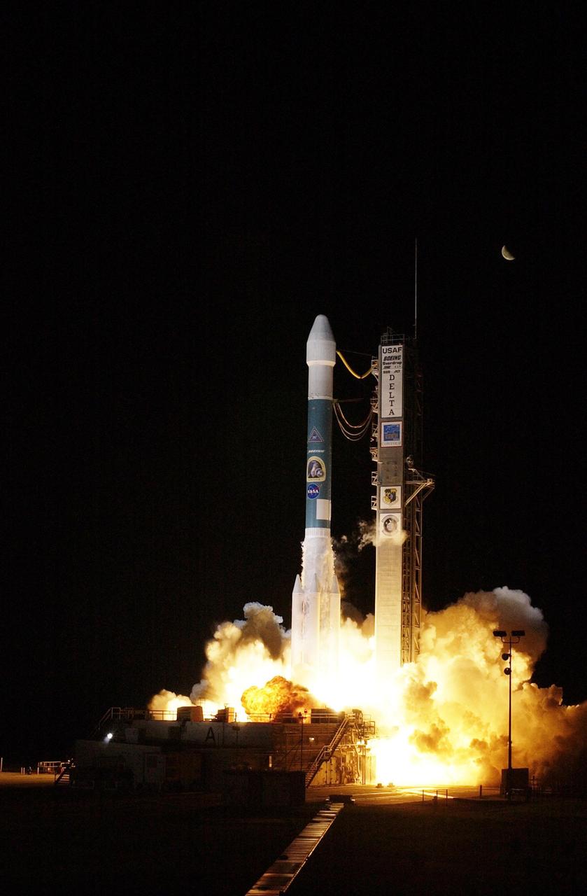 KENNEDY SPACE CENTER, FLA. - A third-quarter moon is the only visible element in the sky as NASA's Comet Nucleus Tour (CONTOUR) spacecraft successfully launches at 2:47 a.m. EDT aboard a Boeing Delta II rocket from Cape Canaveral Air Force Station, Fla. Designed and built by The Johns Hopkins University Applied Physics Laboratory (APL) in Laurel, Md., the 2,138-pound (970-kilogram) spacecraft was placed into an elliptical Earth orbit 63 minutes after launch. About 19 minutes later the mission operations team at APL acquired a signal from the spacecraft through the Deep Space Network antenna station in Goldstone, Calif., and by 5:45 a.m. EDT Mission Director Dr. Robert W. Farquhar of the Applied Physics Lab confirmed the craft was operating normally and ready to carry out its early orbit maneuvers. CONTOUR will orbit Earth until Aug. 15, when it is scheduled to fire its main engine and enter a comet-chasing orbit around the sun. The mission's flexible four-year plan includes encounters with comets Encke (Nov. 12, 2003) and Schwassmann-Wachmann 3 (June 19, 2006), though it can add an encounter with a "new" and scientifically valuable comet from the outer solar system, should one be discovered in time for CONTOUR to fly past it. CONTOUR's four scientific instruments will take detailed pictures and measure the chemical makeup of each comet's nucleus -- a chunk of ice and rock -- while analyzing the surrounding gas and dust.