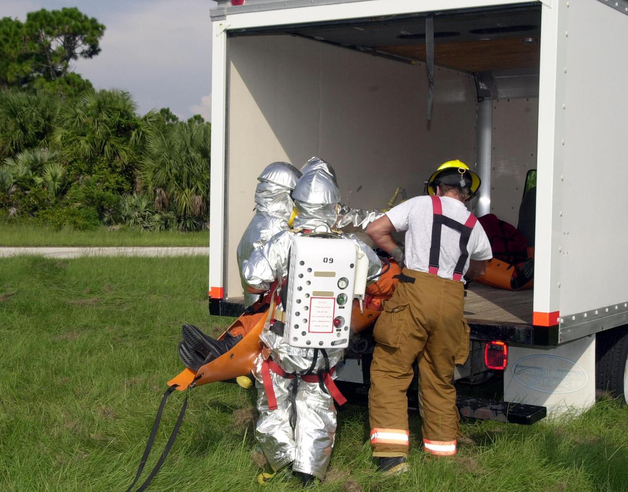 KENNEDY SPACE CENTER, FLA. - "Astronauts" were safely and successfully recovered from a "downed" Space Shuttle in a Mode VII contingency simulation led by Don Hammel, NASA Landing and Recovery Director. KSC Fire/Rescue and Emergency Medical workers, along with Johnson Space Center and Patrick Air Force Base personnel, participated in the drill. Mode simulations are held periodically at KSC to ensure contingency response forces are well prepared to respond to a wide variety of potential emergency situations.