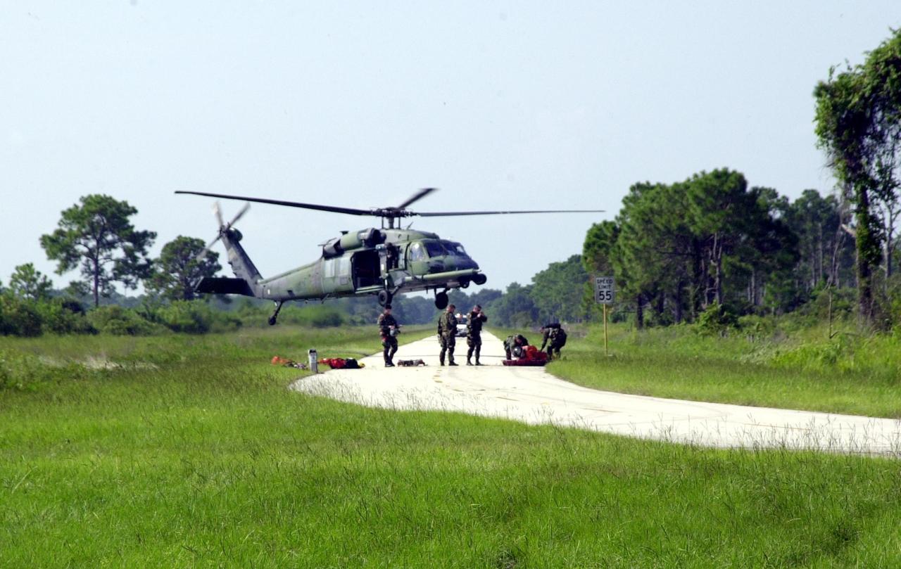KENNEDY SPACE CENTER, FLA. - "Astronauts" were safely and successfully recovered from a "downed" Space Shuttle in a Mode VII contingency simulation led by Don Hammel, NASA Landing and Recovery Director. KSC Fire/Rescue and Emergency Medical workers, along with Johnson Space Center and Patrick Air Force Base personnel, participated in the drill. Mode simulations are held periodically at KSC to ensure contingency response forces are well prepared to respond to a wide variety of potential emergency situations.