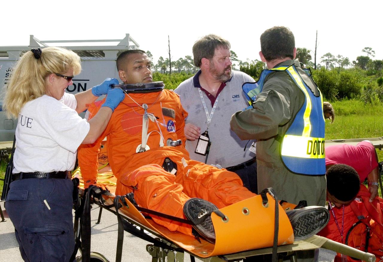 KENNEDY SPACE CENTER, FLA. - "Astronauts" were safely and successfully recovered from a "downed" Space Shuttle in a Mode VII contingency simulation led by Don Hammel, NASA Landing and Recovery Director. KSC Fire/Rescue and Emergency Medical workers, along with Johnson Space Center and Patrick Air Force Base personnel, participated in the drill. Mode simulations are held periodically at KSC to ensure contingency response forces are well prepared to respond to a wide variety of potential emergency situations.