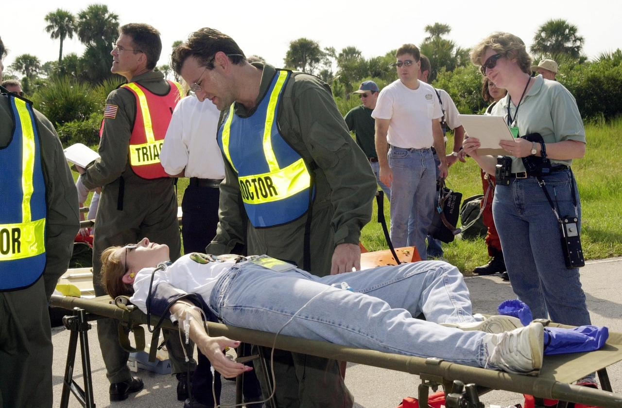 KENNEDY SPACE CENTER, FLA. - "Astronauts" were safely and successfully recovered from a "downed" Space Shuttle in a Mode VII contingency simulation led by Don Hammel, NASA Landing and Recovery Director. KSC Fire/Rescue and Emergency Medical workers, along with Johnson Space Center and Patrick Air Force Base personnel, participated in the drill. Mode simulations are held periodically at KSC to ensure contingency response forces are well prepared to respond to a wide variety of potential emergency situations.