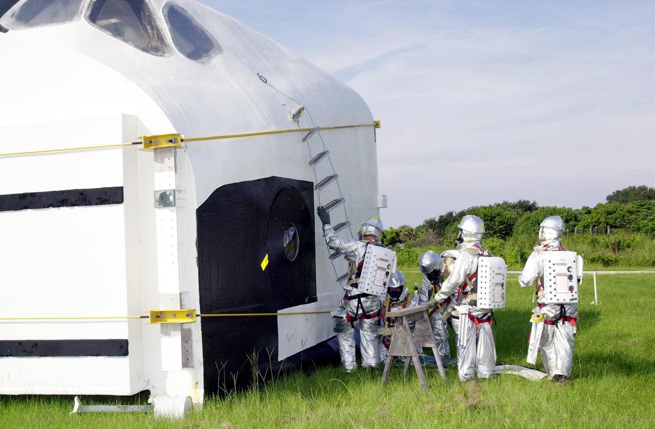 KENNEDY SPACE CENTER, FLA. - "Astronauts" were safely and successfully recovered from a "downed" Space Shuttle in a Mode VII contingency simulation led by Don Hammel, NASA Landing and Recovery Director. KSC Fire/Rescue and Emergency Medical workers, along with Johnson Space Center and Patrick Air Force Base personnel, participated in the drill. Mode simulations are held periodically at KSC to ensure contingency response forces are well prepared to respond to a wide variety of potential emergency situations.