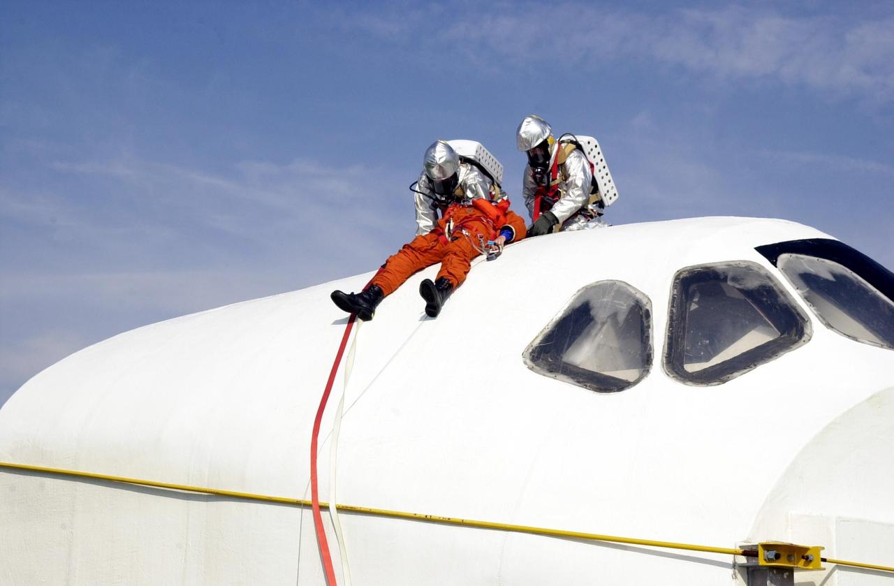 KENNEDY SPACE CENTER, FLA. -- "Astronauts" were safely and successfully recovered from a "downed" Space Shuttle in a Mode VII contingency simulation led by Don Hammel, NASA Landing and Recovery Director. KSC Fire/Rescue and Emergency Medical workers, along with Johnson Space Center and Patrick Air Force Base personnel, participated in the drill. Mode simulations are held periodically at KSC to ensure contingency response forces are well prepared to respond to a wide variety of potential emergency situations.