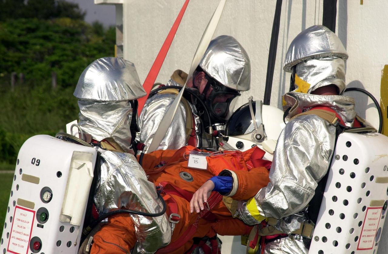 KENNEDY SPACE CENTER, FLA. - "Astronauts" were safely and successfully recovered from a "downed" Space Shuttle in a Mode VII contingency simulation led by Don Hammel, NASA Landing and Recovery Director. KSC Fire/Rescue and Emergency Medical workers, along with Johnson Space Center and Patrick Air Force Base personnel, participated in the drill. Mode simulations are held periodically at KSC to ensure contingency response forces are well prepared to respond to a wide variety of potential emergency situations.