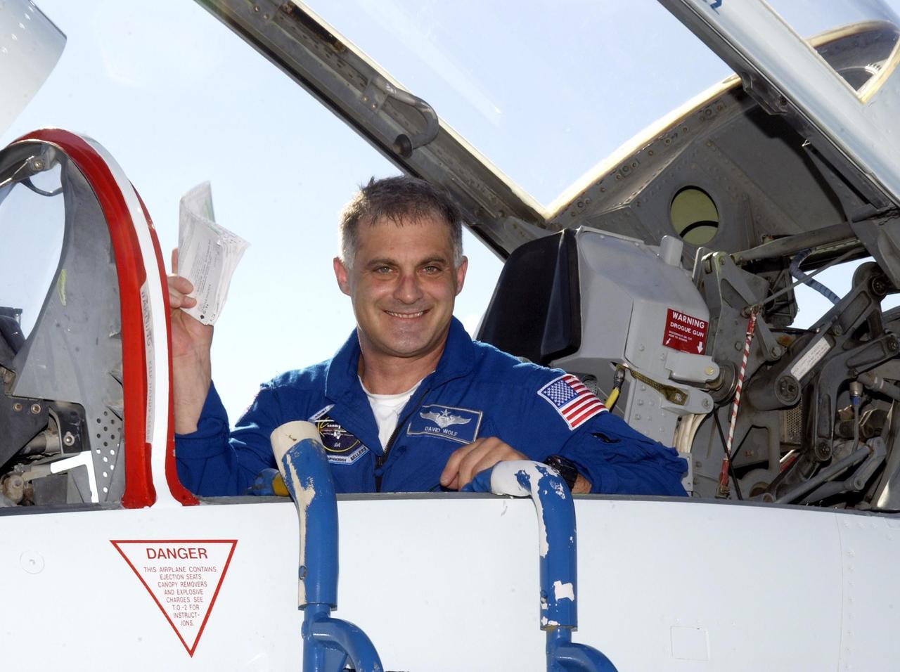 KENNEDY SPACE CENTER, Fla. -  STS-112 Mission Specialist David Wolf arrives at the KSC Shuttle Landing Facility aboard a T-38 jet aircraft.  He and the rest of the crew will be taking part in Terminal Countdown Demonstration Test activities in preparation for the mission aboard Space Shuttle Atlantis, which is scheduled to launch no earlier than Oct. 2, between 2 and 6 p.m. EDT.  STS-112 is the 15th assembly mission to the International Space Station.  Atlantis will be carrying the S1 Integrated Truss Structure, the first starboard truss segment.  The S1 will be attached to the central truss segment, S0, during the 11-day mission.