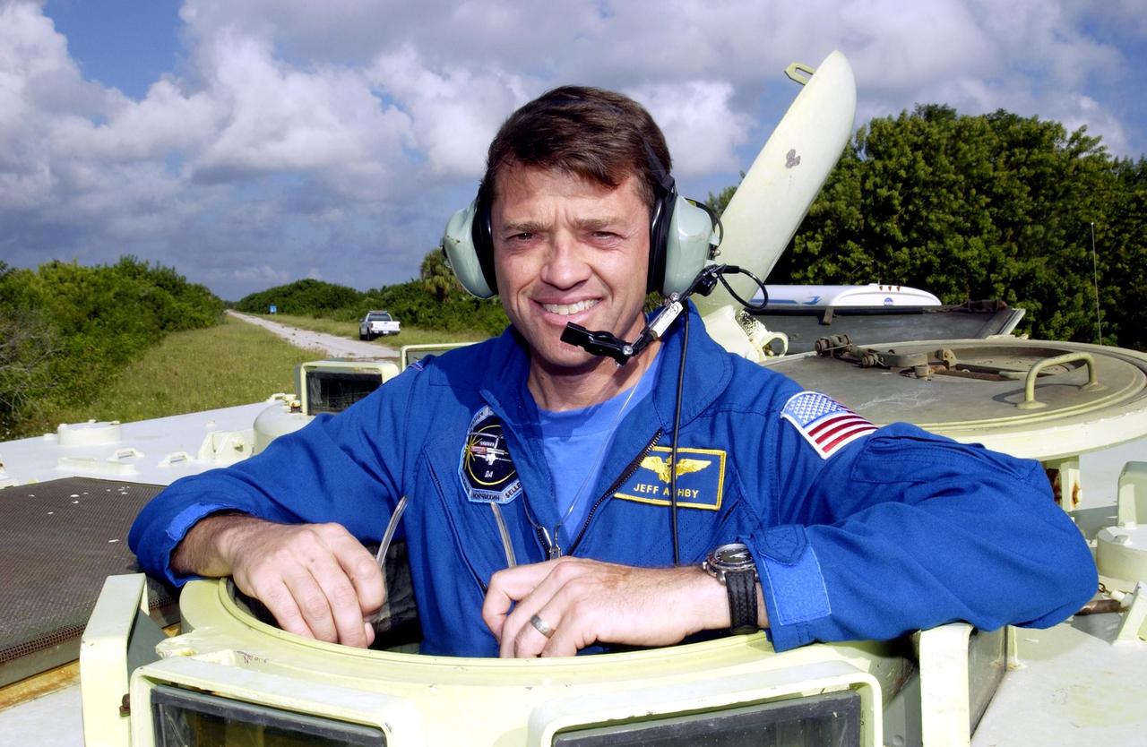 KENNEDY SPACE CENTER, FLA. --   STS-112 Commander Jeffrey Ashby is ready for his practice run driving the M-113 armored personnel carrier.  Ashby and the rest of the crew are at KSC for Terminal Countdown Demonstration Test activities, which include emergency egress training and driving the M-113.  Mission STS-112 aboard Space Shuttle Atlantis is scheduled to launch no earlier than Oct. 2, between 2 and 6 p.m. EDT.  STS-112 is the 15th assembly mission to the International Space Station.  Atlantis will be carrying the S1 Integrated Truss Structure, the first starboard truss segment.  The S1 will be attached to the central truss segment, S0, during the 11-day mission.