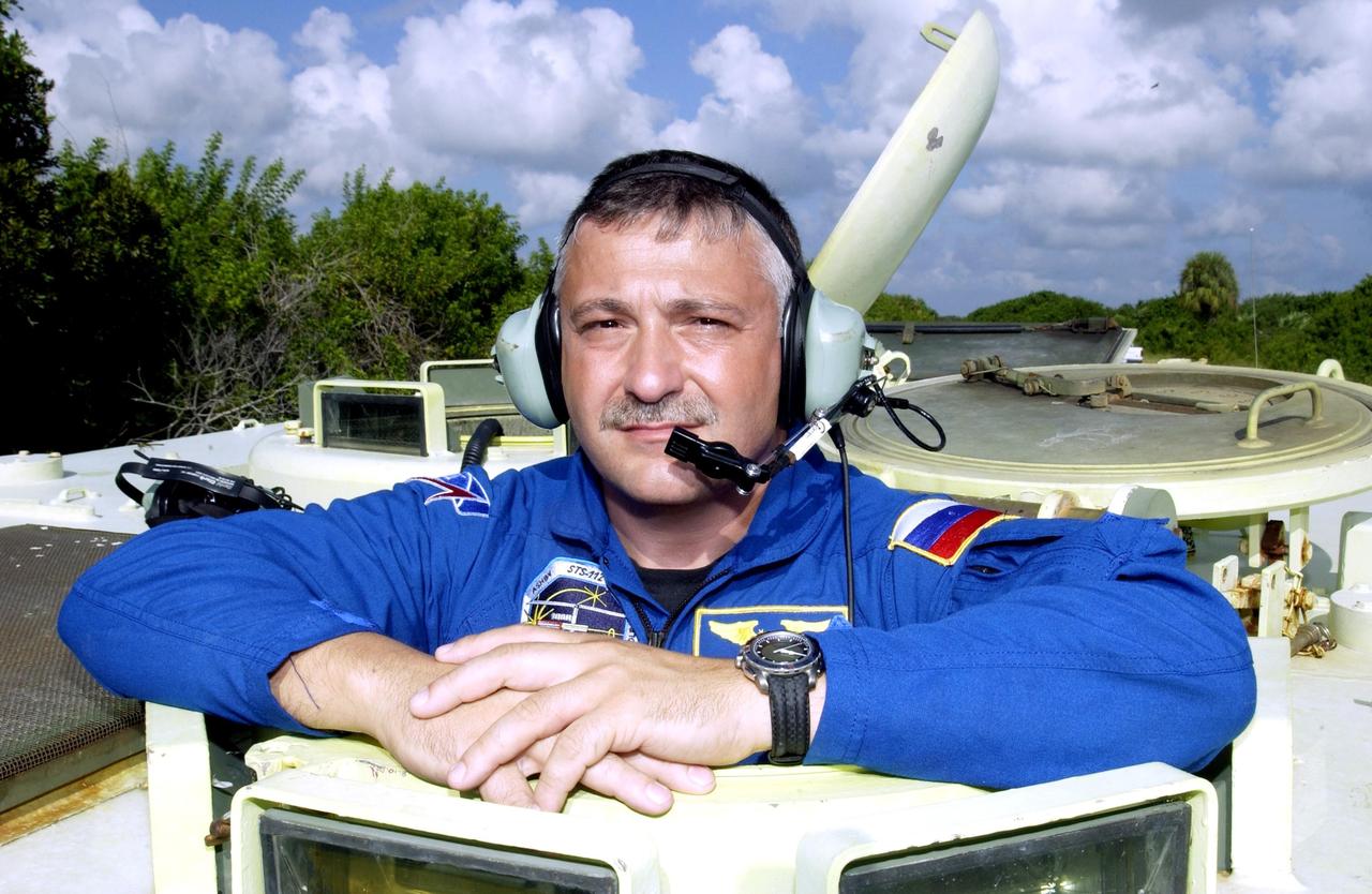 KENNEDY SPACE CENTER, Fla. - STS-112 Mission Specialist Fyodor Yurchikhin, with the Russian Space Agency, Ashby is ready for his practice run driving the M-113 armored personnel carrier.  Yurchikhin and the rest of the crew are at KSC for Terminal Countdown Demonstration Test activities, which also include a simulated launch countdown.  Mission STS-112 aboard Space Shuttle Atlantis is scheduled to launch no earlier than Oct. 2, between 2 and 6 p.m. EDT.  STS-112 is the 15th assembly mission to the International Space Station.  Atlantis will be carrying the S1 Integrated Truss Structure, the first starboard truss segment.  The S1 will be attached to the central truss segment, S0, during the 11-day mission.