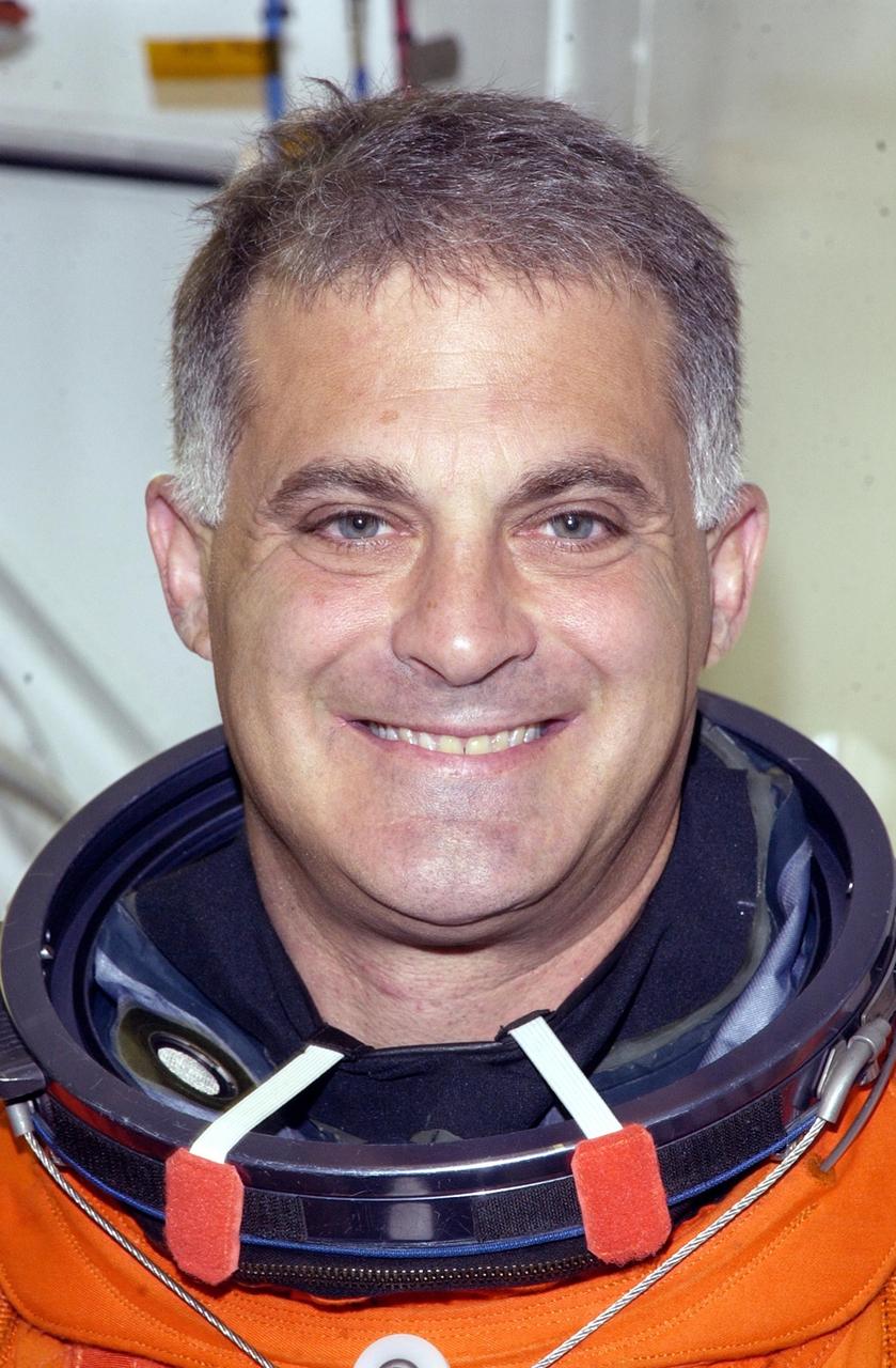 KENNEDY SPACE CENTER, FLA. -- STS-112  Mission Specialist David Wolf, M.D., takes a break from training at Pad 39B during Terminal Countdown Demonstration Test activities, which include a simulated launch countdown.  Launch of STS-112 aboard Space Shuttle Atlantis is scheduled for Oct. 2, between 2 and 6 p.m. EDT.  STS-112 is the 15th assembly mission to the International Space Station.  Atlantis will be carrying the S1 Integrated Truss Structure, the first starboard truss segment, to be attached to the central truss segment, S0, and the Crew and Equipment Translation Aid (CETA) Cart A.  The CETA is the first of two human-powered carts that will ride along the ISS railway, providing mobile work platforms for future spacewalking astronauts.  