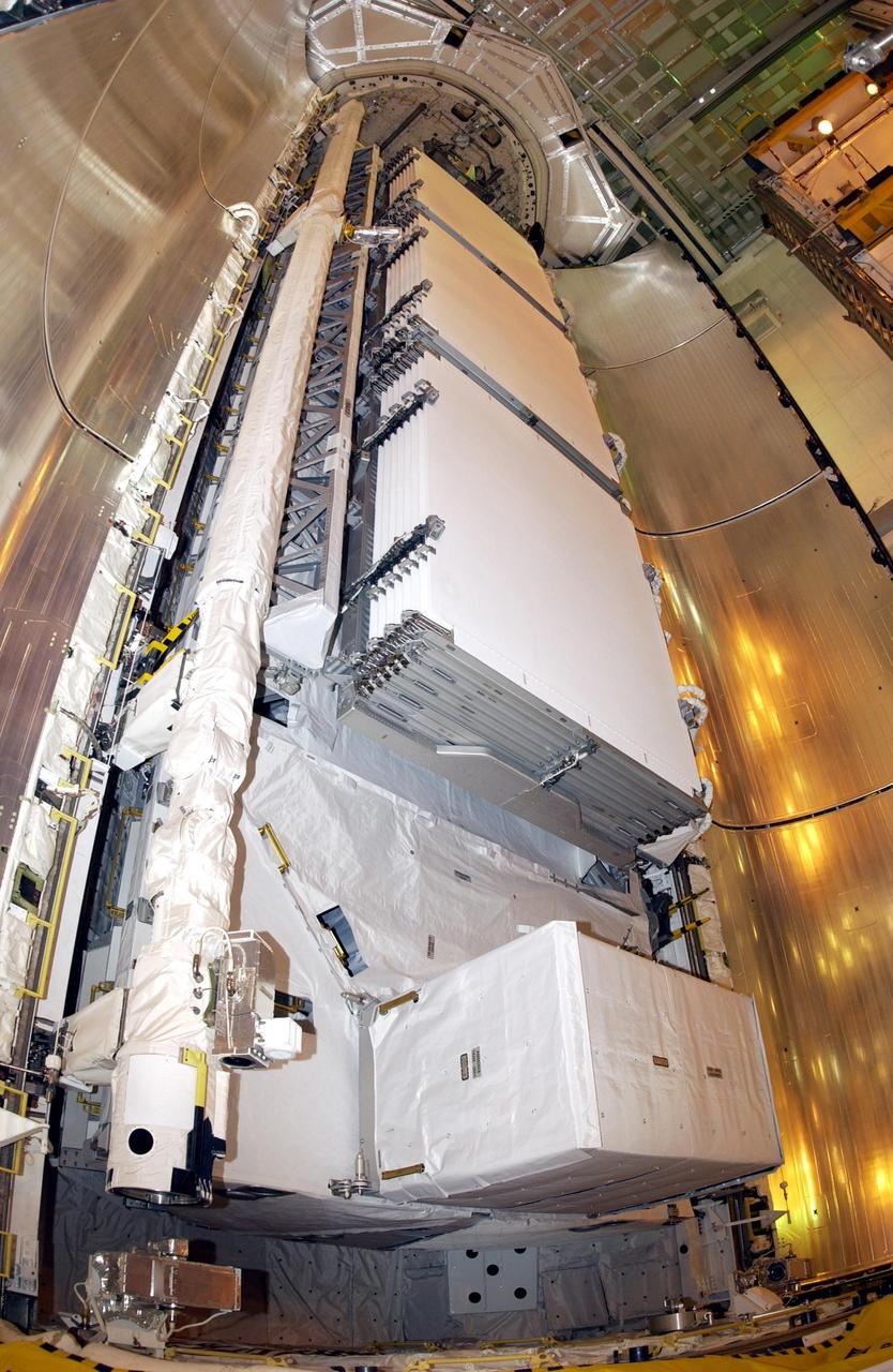 KENNEDY SPACE CENTER, FLA. -- -- The payload for mission STS-112 rests inside the payload bay of Space Shuttle Atlantis. The Shuttle is carrying the S1 Integrated Truss Structure, the first starboard truss segment, to be attached to the central truss segment, S0, plus the Crew and Equipment Translation Aid (CETA) Cart A. The CETA is the first of two human-powered carts that will ride along the ISS railway, providing mobile work platforms for future spacewalking astronauts. Launch of Atlantis is scheduled for Oct. 2 with a crew of six. The 11-day mission includes three spacewalks.