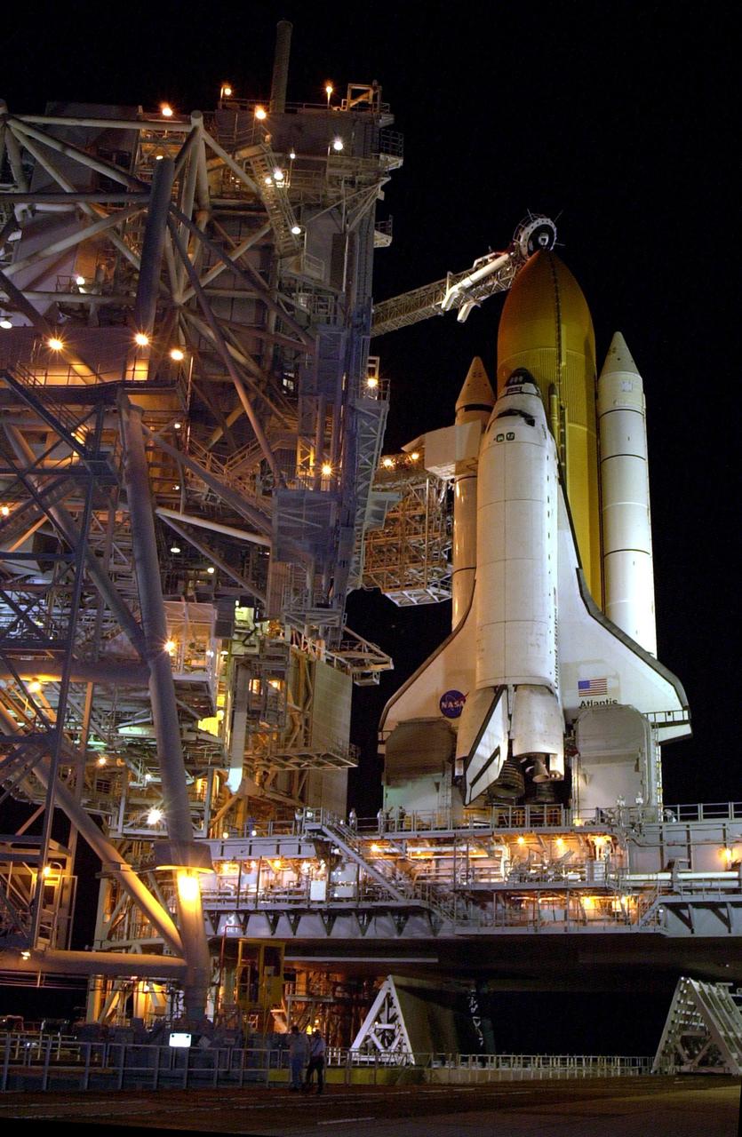 KENNEDY SPACE CENTER, FLA. -- The Rotating Service Structure rolls back to reveal Space Shuttle Atlantis on pad 39B prior to launch. The Shuttle is scheduled for launch Oct. 7 at 3:46 p.m. EDT on mission STS-112.