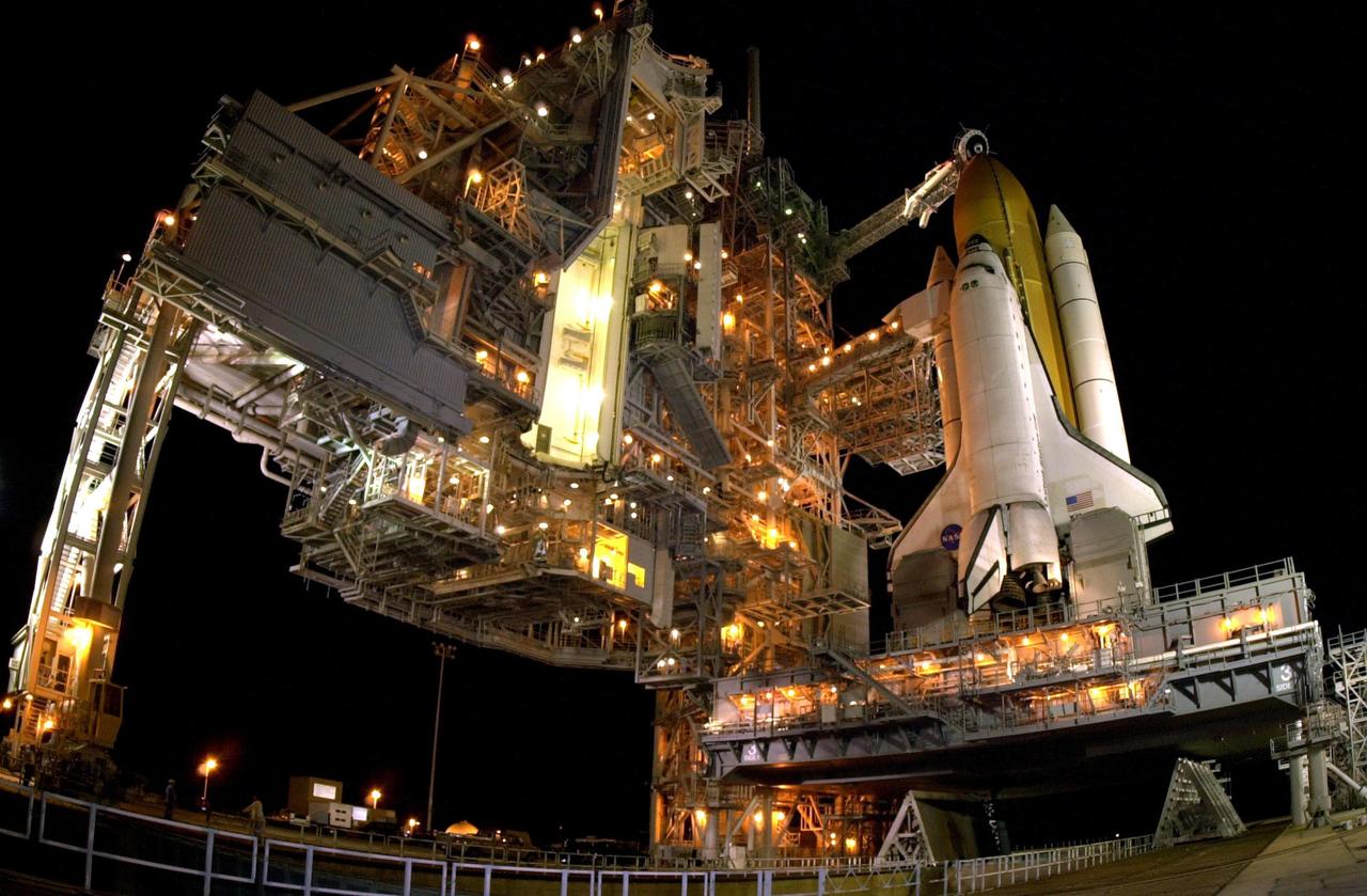 KENNEDY SPACE CENTER, FLA. -- The Rotating Service Structure is rolled back to reveal Space Shuttle Atlantis on pad 39B prior to launch. The Shuttle is scheduled for launch Oct. 7 at 3:46 p.m. EDT on mission STS-112.