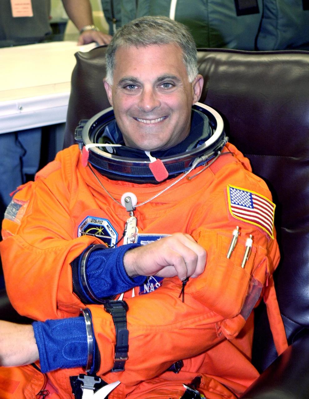 KENNEDY SPACE CENTER, FLA. -- STS-112 Mission Specialist David Wolf suits up for launch, just hours away. STS-112 is the 15th assembly flight to the International Space Station, carrying the S1 Integrated Truss Structure and the Crew and Equipment Translation Aid (CETA) Cart A. The CETA is the first of two human-powered carts that will ride along the ISS railway, providing mobile work platforms for future spacewalking astronauts. On the 11-day mission, three spacewalks are planned to attach the S1 truss to the Station. Launch is scheduled for 3:46 p.m. EDT from Launch Pad 39B. .