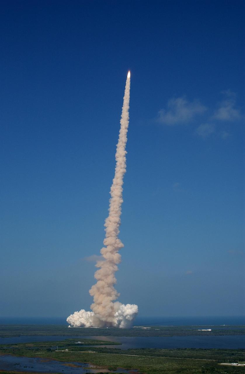 KENNEDY SPACE CENTER, FLA. - Looking like a star balanced on a stem of smoke, Space Shuttle Atlantis shoots through the clear blue sky after launch on mission STS-112, the 15th assembly flight to the International Space Station. Liftoff from Launch Pad 39B occurred at 3:46 p.m. EDT. Atlantis carries the S1 Integrated Truss Structure and the Crew and Equipment Translation Aid (CETA) Cart A. The CETA is the first of two human-powered carts that will ride along the ISS railway, providing mobile work platforms for future spacewalking astronauts. On the 11-day mission, three spacewalks are planned to attach the S1 truss.