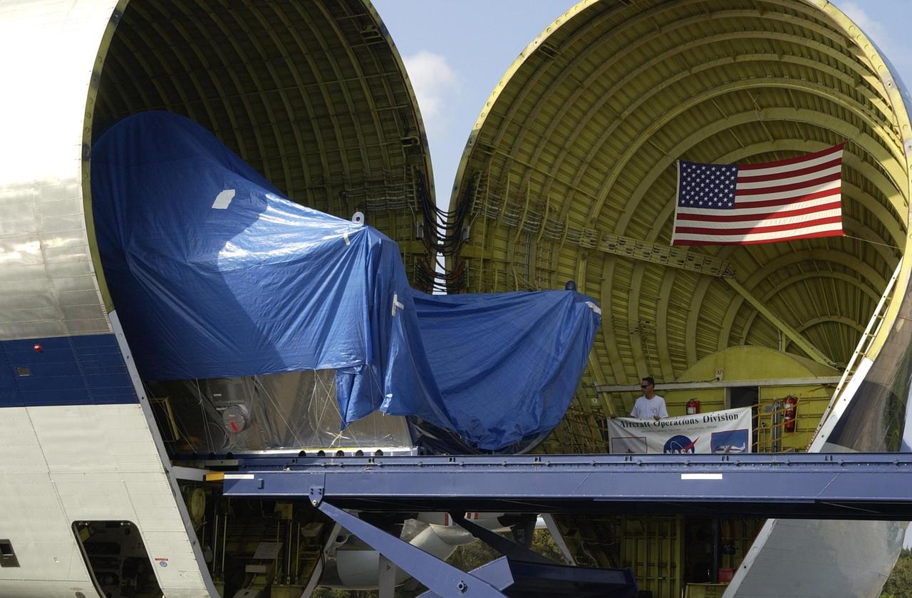 KENNEDY SPACE CENTER, FLA. -- The node structural test article (STA) is prepared to be offloaded through the open nose of the Super Guppy transport aircraft following its arrival at Kennedy Space Center from Marshall Space Flight Center in Huntsville, Ala. It was moved to KSC for storage. An exact replica of the Unity Node on the International Space Station, the node STA was used at MSFC for testing and validation purposes. The Unity Node is the pressurized element that connects the other ISS pressurized modules together and was the first U.S. element to launch.