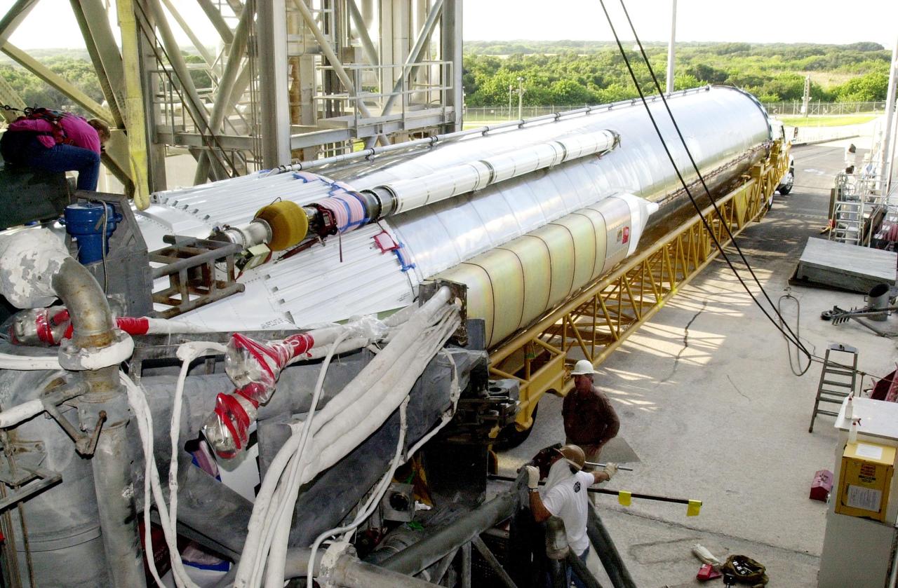 KENNEDY SPACE CENTER, FLA.  -- The first stage of an Atlas/Centaur booster (AC-144) is delivered to Launch Complex 36A at Cape Canaveral Air Force Station in preparation for the launch of TDRS-J. The third in a series of telemetry satellites, TDRS-J will help replenish the current constellation of geosynchronous TDRS satellites. The TDRS System is the primary source of space-to-ground voice, data and telemetry for the Space Shuttle. It also provides communications with the International Space Station and scientific spacecraft in low-Earth orbit, such as the Hubble Space Telescope. This new advanced series of satellites will extend the availability of TDRS communications services until about 2017.