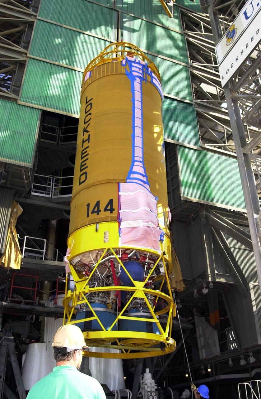 KENNEDY SPACE CENTER, FLA. -- At Launch Complex 36-A, Cape Canaveral Air Force Station, a Lockheed Martin Atlas Centaur IIA (AC-144) rocket is lifted up the launch tower. The rocket will be used in the launch of TDRS-J, scheduled for  Nov. 20.  The third in a series of telemetry satellites, TDRS-J will help replenish the current constellation of geosynchronous TDRS satellites. The TDRS System is the primary source of space-to-ground voice, data and telemetry for the Space Shuttle. It also provides communications with the International Space Station and scientific spacecraft in low-Earth orbit such as the Hubble Space Telescope. This new advanced series of satellites will extend the availability of TDRS communications services until about 2017.