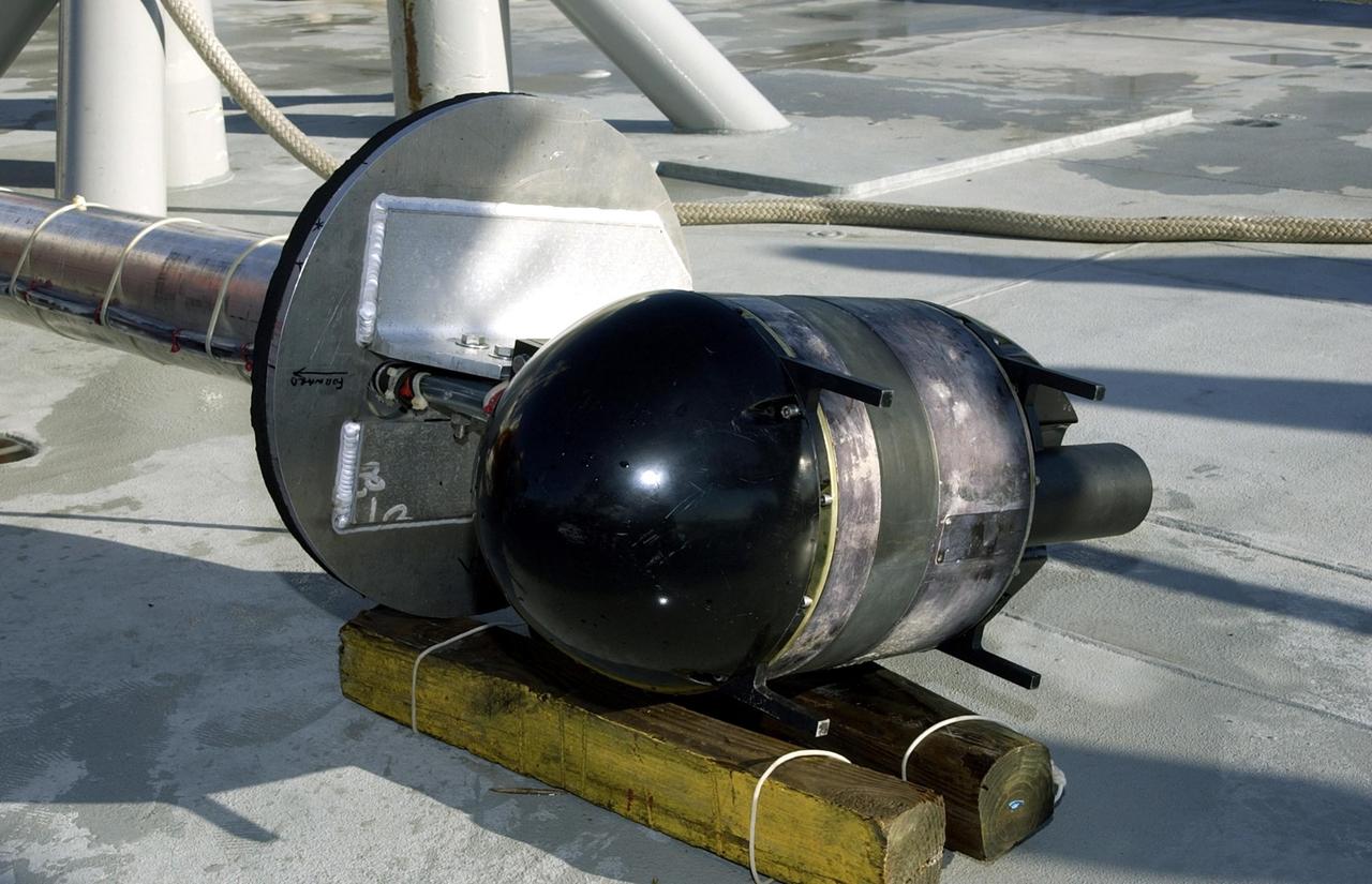 KENNEDY SPACE CENTER, FLA. --  Sonar mapping equipment lies on the deck of the Liberty Star, one of NASA's solid rocket booster retrieval ships.  The equipment will be attached to the ship's hull for an eight-day expedition surveying deep-water coral reefs on the Oculina Banks off eastern Florida.  NASA joins the National Oceanic and Atmospheric Administration (NOAA) and other ocean scientists for the sophisticated mapping system that will provide the first high-resolution, three-dimensional map of the Oculina Banks.  The survey results are expected to guide another expedition in Spring 2003, using NASA's ship, when the reef fish spawn.  Also used will be NASA's underwater robot and an acoustic hydrophone system for listening to fish and vessel noise.  Dive sites will be chosen based on the new charts.