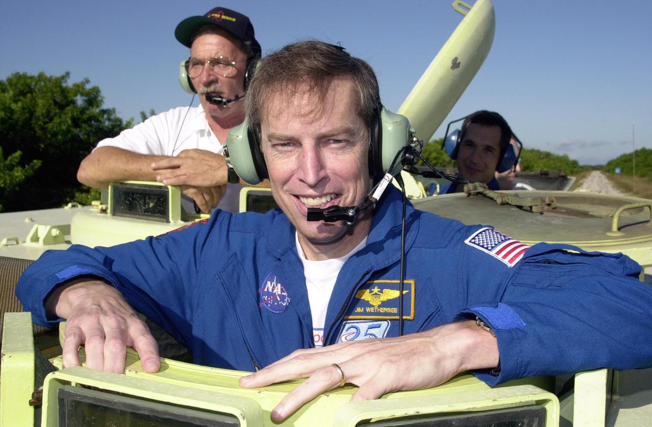 KENNEDY SPACE CENTER, FLA. - STS-113 Mission Commander James Wetherbee gets ready to drive an M-113 armored personnel carrier, part of emergency egress training during Terminal Countdown Demonstration Test activities. He and the rest of the crew are preparing for the mission aboard Space Shuttle Endeavour, which is scheduled to launch Nov. 10. The TCDT includes a launch countdown. The primary payloads on mission STS-113 are the first port truss segment, P1, and the Crew and Equipment Translation Aid (CETA) Cart B. Once delivered, the P1 truss will remain stowed until flight 12A.1 in 2003 when it will be attached to the central truss segment, S0, on the Space Station. Also onboard Space Shuttle Endeavour will be the Expedition 6 crew who will replace Expedition 5, returning to Earth after 4 months.