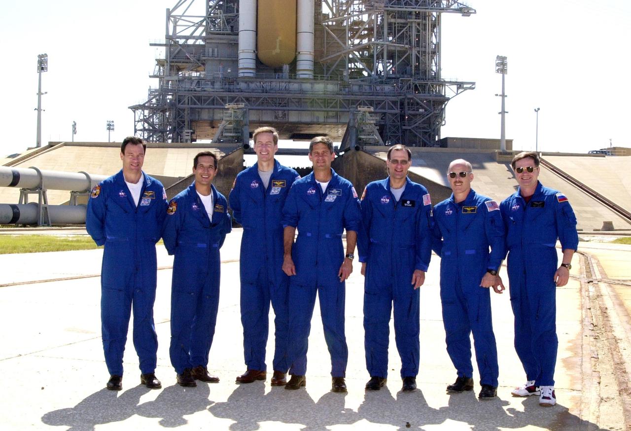 KENNEDY SPACE CENTER, FLA. -   The STS-113 and Expedition 6 crews pause for a photo during Terminal Countdown Demonstration Test activities at the pad.  From left are STS-113 Mission Specialists Michael Lopez-Alegria and John Herrington, Commander James Wetherbee and Pilot Paul Lockhart; Expedition 6 astronaut Donald Pettit, Commander Ken Bowersox and cosmonaut Nikolai Budarin. The TCDT also includes a simulated launch countdown.  The 16th assembly flight to the International Space Station, STS-113 will carry the Port 1 (P1) truss aboard Space Shuttle Endeavour as well as the Expedition 6 crew, who will replace Expedition 5 on the Station. Mission STS-113 is scheduled to launch Nov. 10, 2002.