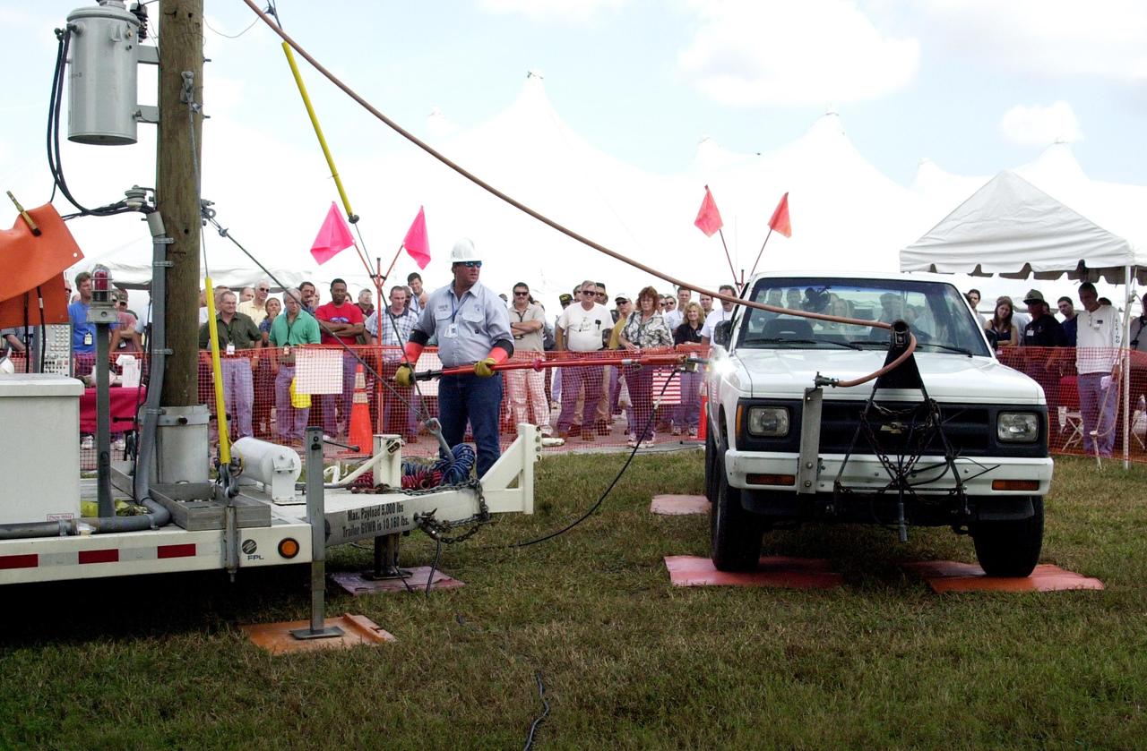 KENNEDY SPACE CENTER, FLA. - KSC employees watch an exhibit during Spaceport Super Safety & Health Day.  Dozens of presentations and exhibits across the Center focused attention on safety at work and home.