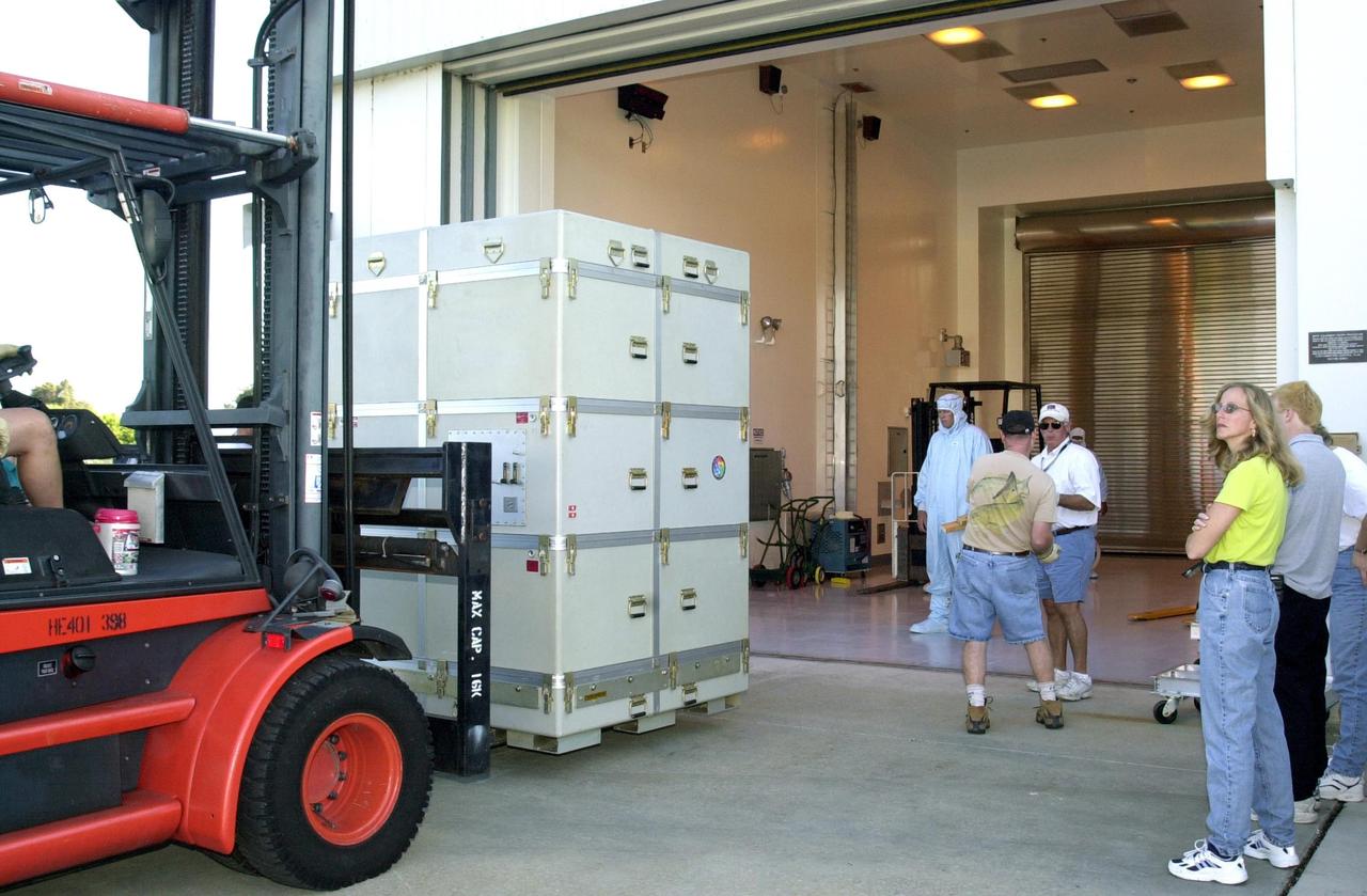 KENNEDY SPACE CENTER, FLA. -- A container with the Solar Radiation and Climate Experiment (SORCE) spacecraft inside is moved into the Multi-Purpose Processing Facility at KSC. The spacecraft will undergo final processing in the MPPF for launch. SORCE is equipped with four instruments that will measure variations in solar radiation much more accurately than anything now in use and observe some of the spectral properties of solar radiation for the first time. With data from NASA's SORCE mission, researchers should be able to follow how the Sun affects our climate now and in the future. The SORCE project is managed by NASA's Goddard Space Flight Center. The instruments on the SORCE spacecraft are built by the Laboratory for Atmospheric and Space Physics (LASP). Launch of SORCE aboard a Pegasus XL rocket is scheduled for mid-December 2002. Launch site is Cape Canaveral Air Force Station, Fla.