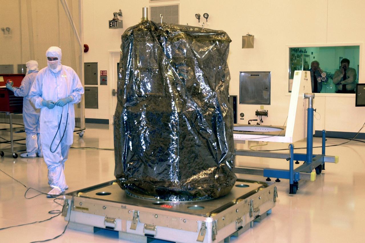 KENNEDY SPACE CENTER, FLA. --  The Solar Radiation and Climate Experiment (SORCE) spacecraft sits in the Multi-Purpose Processing Facility at KSC after being removed from the transport container. SORCE arrived at Kennedy Space Center Oct. 26 to begin final processing.  SORCE is equipped with four instruments that will measure variations in solar radiation much more accurately than anything now in use and observe some of the spectral properties of solar radiation for the first time. With data from NASA's SORCE mission, researchers should be able to follow how the Sun affects our climate now and in the future.  The SORCE project is managed by NASA's Goddard Space Flight Center.  The instruments on the SORCE spacecraft are built by the Laboratory for Atmospheric and Space Physics (LASP).  Launch of SORCE aboard a Pegasus XL rocket is scheduled for mid-December 2002.  Launch site is Cape Canaveral Air Force Station, Fla.