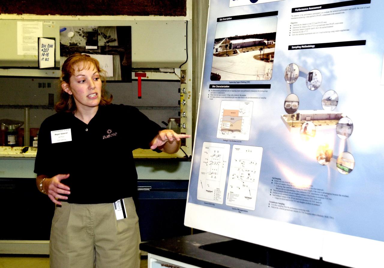 KENNEDY SPACE CENTER, FLA. - New methods of environmental cleanup are explained to government and business representatives, scientists and engineers during a presentation at Launch Complex 34-A, Cape Canaveral Spaceport.  Making the presentation is Megan Gaberell with Battelle Memorial Institute.