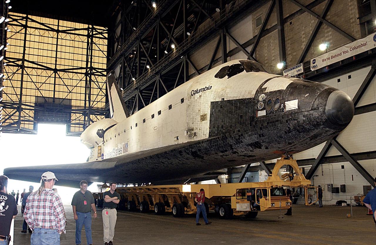 KENNEDY SPACE CENTER, FLA. -- Space Shuttle Columbia sits atop its transporter in the transfer aisle of the Vehicle Assembly Building awaiting further processing for the flight of mission STS-107. Launch is now targeted for no earlier than Jan. 16, 2003. The STS-107 mission will be dedicated to microgravity research. The payloads include the Hitchhiker Bridge, a carrier for the Fast Reaction Experiments Enabling Science, Technology, Applications and Research (FREESTAR) incorporating eight high priority secondary attached Shuttle experiments, and the SHI Research Double Module (SHI/RDM), also known as SPACEHAB.
