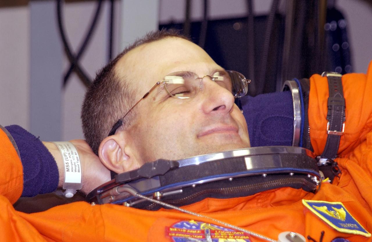 KENNEDY SPACE CENTER, FLA. --  Expedition 6 flight engineer Donald Pettit relaxes during suitup for launch.   Pettit will be making his first Shuttle flight. The primary mission for the crew is bringing the Expedition 6 crew to the Station and returning the Expedition 5 crew to Earth.  The major objective of the mission is delivery of the Port 1 (P1) Integrated Truss Assembly, which will be attached to the port side of the S0 truss.  Three spacewalks are planned to install and activate the truss and its associated equipment.  Launch of Space Shuttle Endeavour on mission STS-113 is scheduled for 8:15 p.m. EST.    