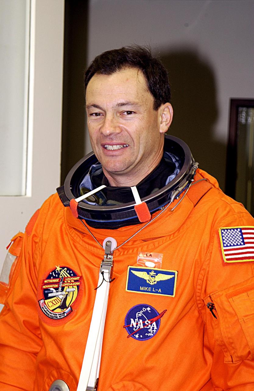 KENNEDY SPACE CENTER, FLA. - STS-113 Mission Specialist Michael Lopez-Alegria suits up for the second launch attempt of mission STS-113. The previous launch on Nov. 22 was scrubbed due to poor weather conditions at the Transoceanic Abort Landing sites. He will be making his third Shuttle flight. The launch will carry the Expedition 6 crew to the Station and return the Expedition 5 crew to Earth. The major objective of the mission is delivery of the Port 1 (P1) Integrated Truss Assembly, which will be attached to the port side of the S0 truss. Three spacewalks are planned to install and activate the truss and its associated equipment. Launch of Space Shuttle Endeavour on mission STS-113 is now scheduled for Nov. 23 at 7:50 p.m. EST.