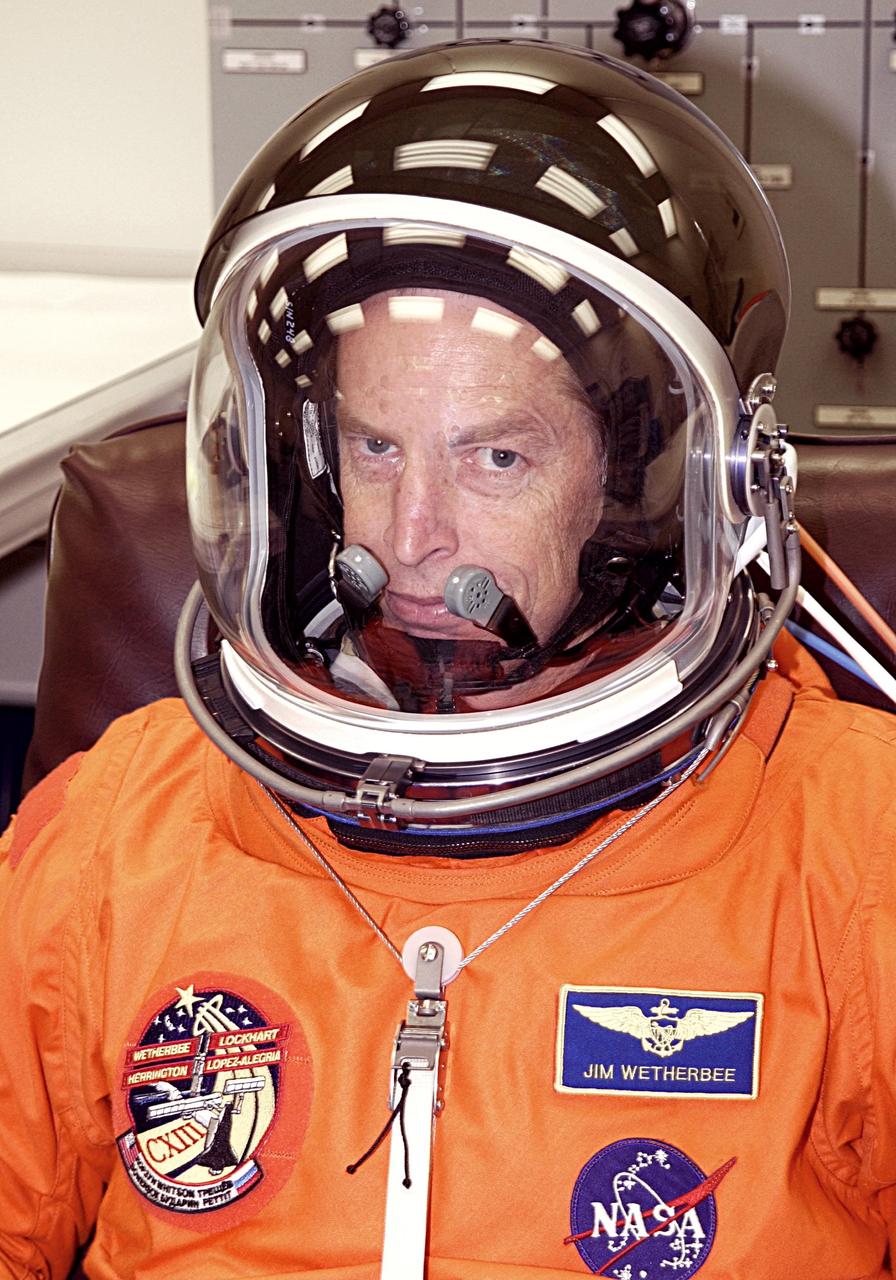 KENNEDY SPACE CENTER, FLA. -- STS-113 Commander James Wetherbee shows a serious side as he suits up for a second launch attempt on mission STS-113. The launch on Nov. 22 was scrubbed due to poor weather conditions at the Transoceanic Abort Landing sites. Wetherbee will be making his sixth Shuttle flight. The launch will carry the Expedition 6 crew to the Station and return the Expedition 5 crew to Earth. The major objective of the mission is delivery of the Port 1 (P1) Integrated Truss Assembly, which will be attached to the port side of the S0 truss. Three spacewalks are planned to install and activate the truss and its associated equipment. Launch of Space Shuttle Endeavour on mission STS-113 is now scheduled for Nov. 23 at 7:50 p.m. EST.