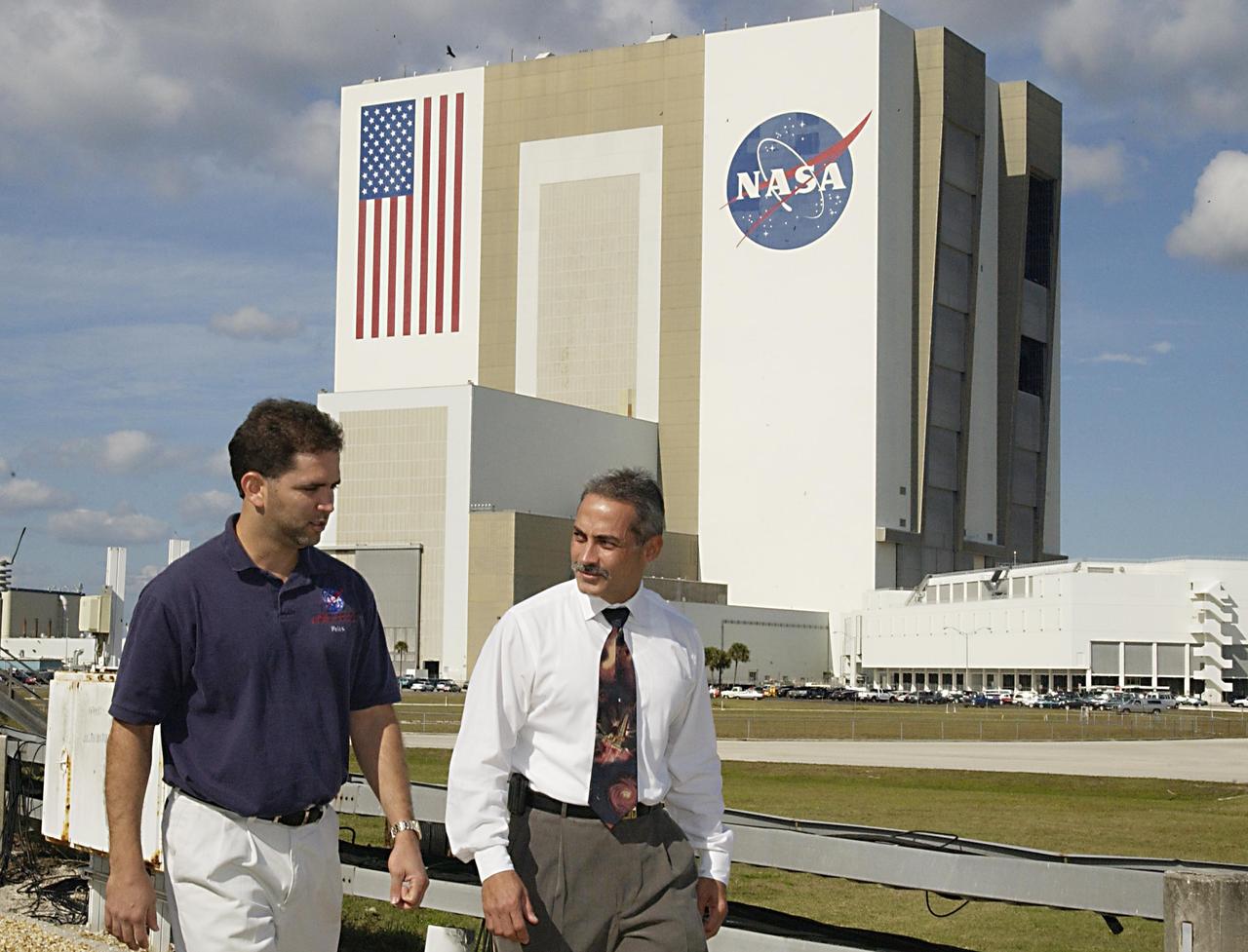 KENNEDY SPACE CENTER, FLA. --   Project Manager Felix Alberto SotoToro, Ph.D. (left), and Cryogenic Propulsion Branch Chief Henry Bursian discuss future business plans.             