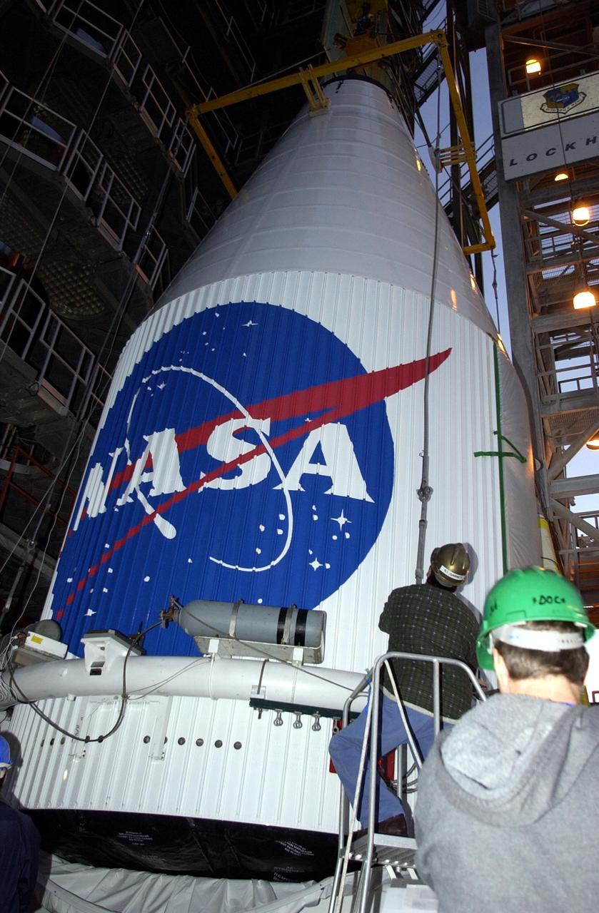 KENNEDY SPACE CENTER, FLA. -- The TDRS-J satellite is prepared for lifting up the gantry on Launch Complex 36-A, Cape Canaveral Air Force Station.  The satellite is scheduled to be launched Dec. 4 aboard an Atlas IIA vehicle.  The launch window is 9:42 to 10:22 p.m. EST. TDRS-J, the third in a series of telemetry satellites, will help replenish the current constellation of geosynchronous TDRS satellites that are the primary source of space-to-ground voice, data and telemetry for the Space Shuttle. The satellites also provide communications with the International Space Station and scientific spacecraft in low-Earth orbit such as the Hubble Space Telescope. This new advanced series of satellites will extend the availability of TDRS communications services until about 2017.