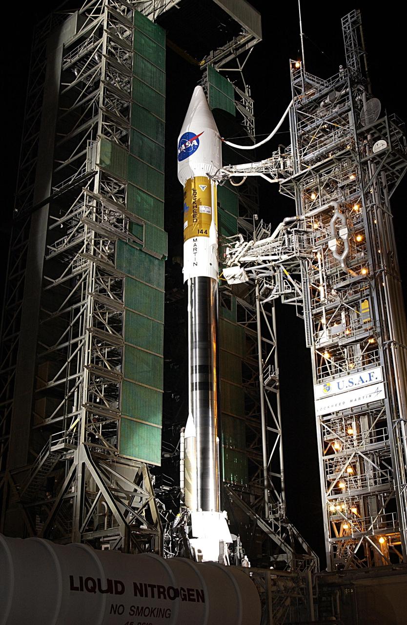 KENNEDY SPACE CENTER, FLA. - At Launch Complex 36-A, Cape Canaveral Air Force Station, the mobile service tower is rolled back to reveal the encapsulated TDRS-J satellite aboard an Atlas IIA vehicle awaiting launch on Dec. 4. The launch window is 9:42 to 10:22 p.m. EST. TDRS-J, the third in a series of telemetry satellites, will help replenish the current constellation of geosynchronous TDRS satellites that are the primary source of space-to-ground voice, data and telemetry for the Space Shuttle. The satellites also provide communications with the International Space Station and scientific spacecraft in low-Earth orbit such as the Hubble Space Telescope. This new advanced series of satellites will extend the availability of TDRS communications services until about 2017.