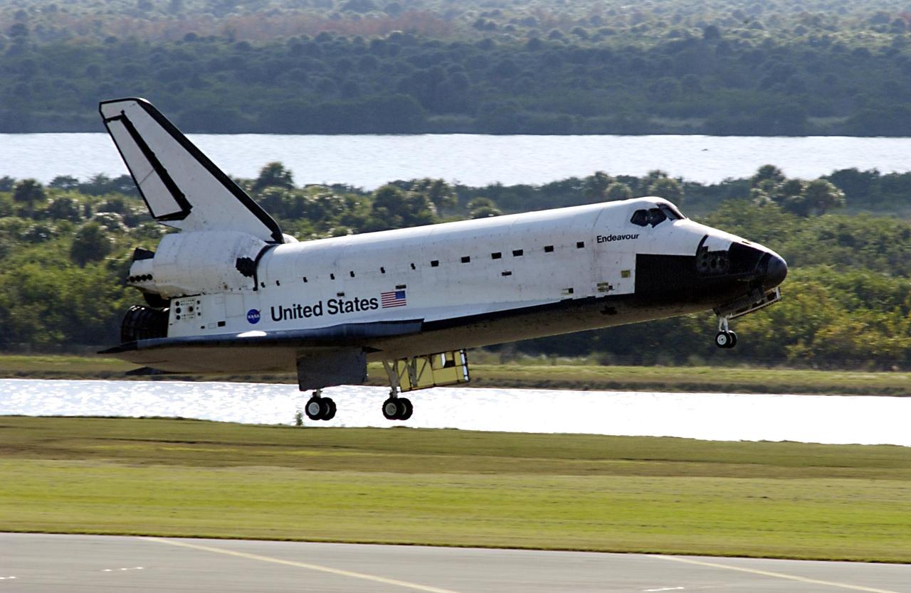 KENNEDY SPACE CENTER, FLA. - Space Shuttle Endeavour is moments away from touching down on runway 33 at the Shuttle Landing Facility after completing the 13-day, 18-hour, 48-minute, 5.74-million mile STS-113 mission to the International Space Station. Main gear touchdown was at 2:37:12 p.m. EST, nose gear touchdown was at 2:37:23 p.m., and wheel stop was at 2:38:25 p.m. Poor weather conditions thwarted landing opportunities until a fourth day, the first time in Shuttle program history that a landing has been waved off for three consecutive days. The vehicle carries the STS-113 crew, Commander James Wetherbee, Pilot Paul Lockhart and Mission Specialists Michael Lopez-Alegria and John Herrington, as well as the returning Expedition Five crew, Commander Valeri Korzun, ISS Science Officer Peggy Whitson and Flight Engineer Sergei Treschev. The installation of the P1 truss on the International Space Station was accomplished during the mission.