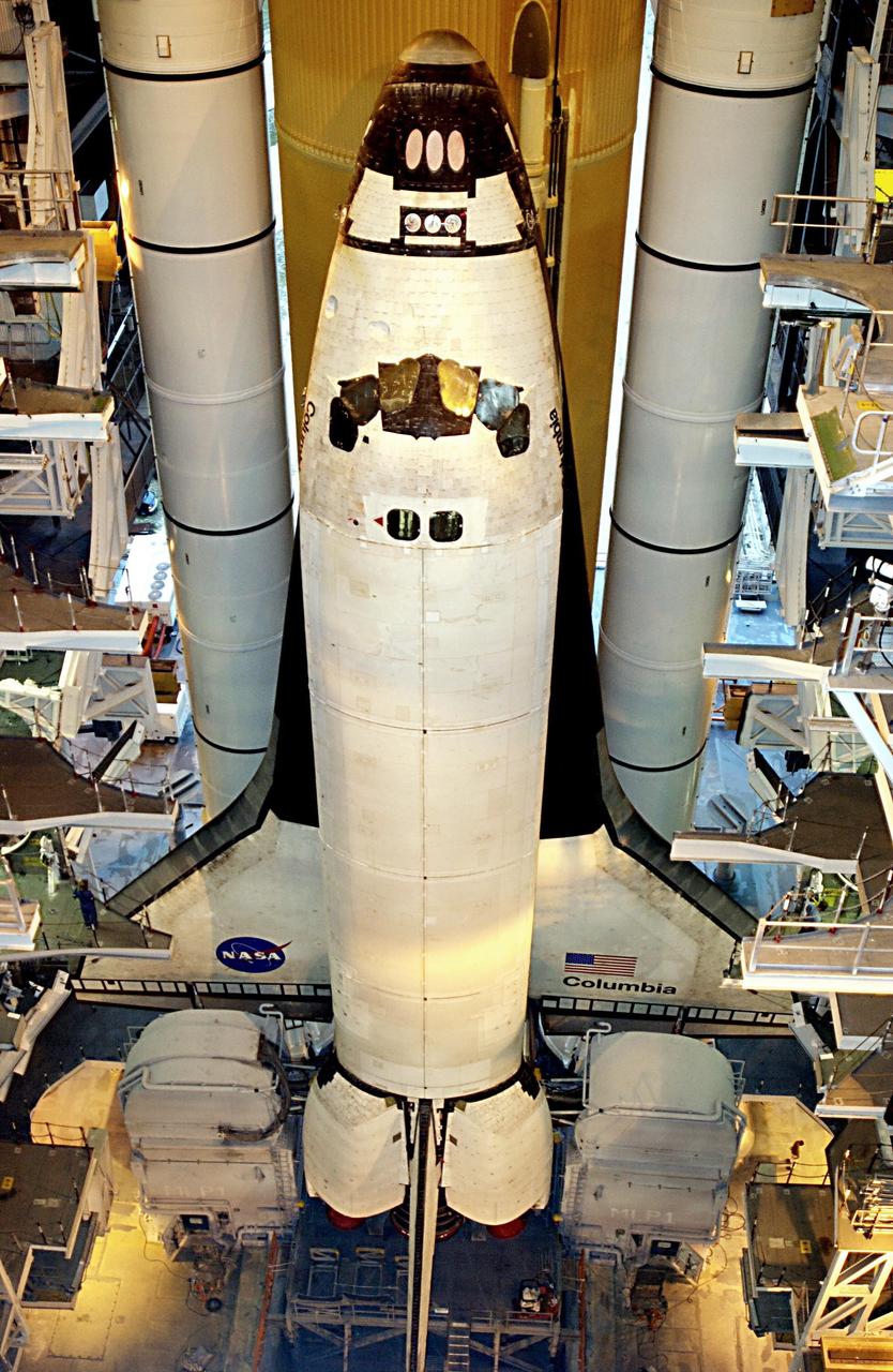 KENNEDY SPACE CENTER, FLA. - Space Shuttle Columbia is poised to begin rollout from the Vehicle Assembly Building to Launch Pad 39A. The STS-107 research mission comprises experiments ranging from material sciences to life sciences (many rats), plus the Fast Reaction Experiments Enabling Science, Technology, Applications and Research (FREESTAR) that incorporates eight high priority secondary attached shuttle experiments. Mission STS-107 is scheduled to launch Jan. 16, 2003.