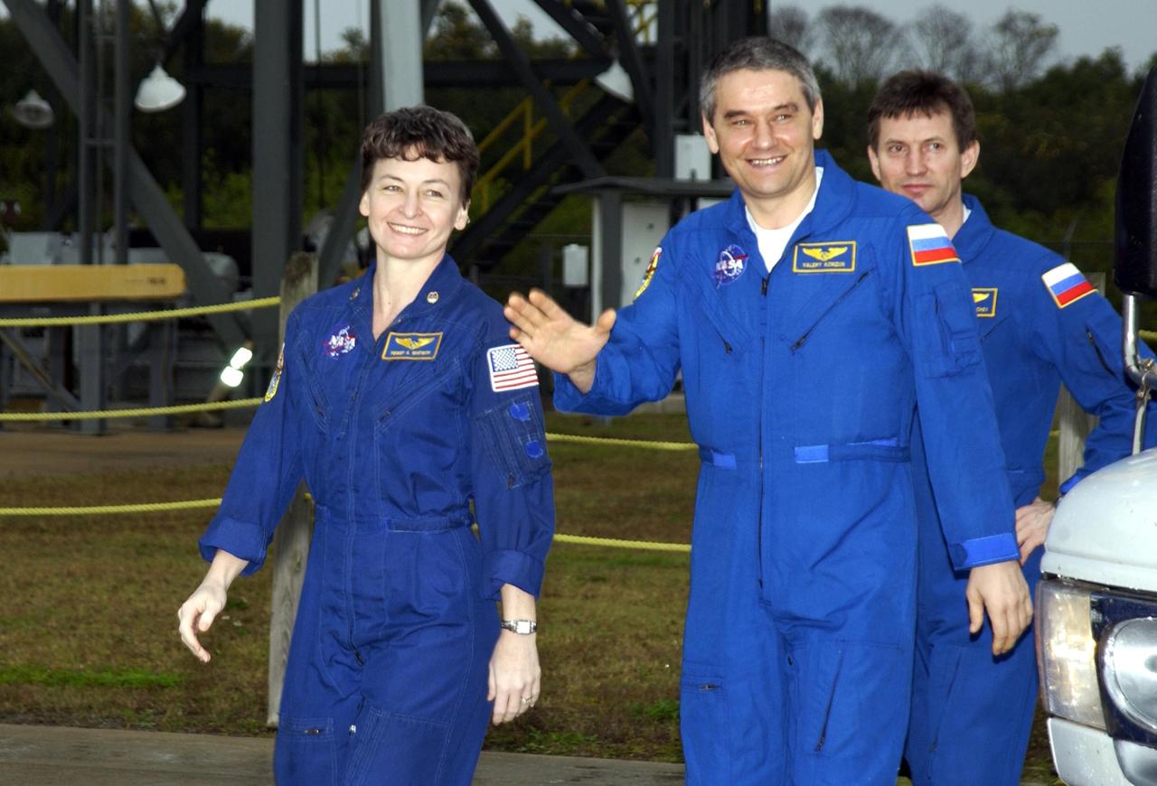 KENNEDY SPACE CENTER, FLA. --  The Expedition Five crew are ready to leave KSC for Houston.  From left are Science Officer Peggy Whitson, Commander Valery Korzun and Flight Engineer Sergei Treschev.  The three returned to Earth on Endeavour Dec. 7, with the STS-113 crew, after six months on the International Space Station.   