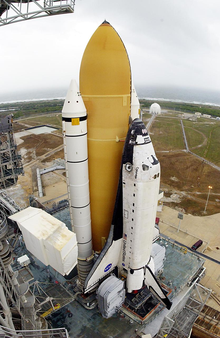 KENNEDY SPACE CENTER, FLA. -- Space Shuttle Columbia sits on Launch Pad 39A, atop the Mobile Launcher Platform. The STS-107 research mission comprises experiments ranging from material sciences to life sciences (many rats), plus the Fast Reaction Experiments Enabling Science, Technology, Applications and Research (FREESTAR) that incorporates eight high priority secondary attached shuttle experiments. Mission STS-107 is scheduled to launch Jan. 16, 2003.      
