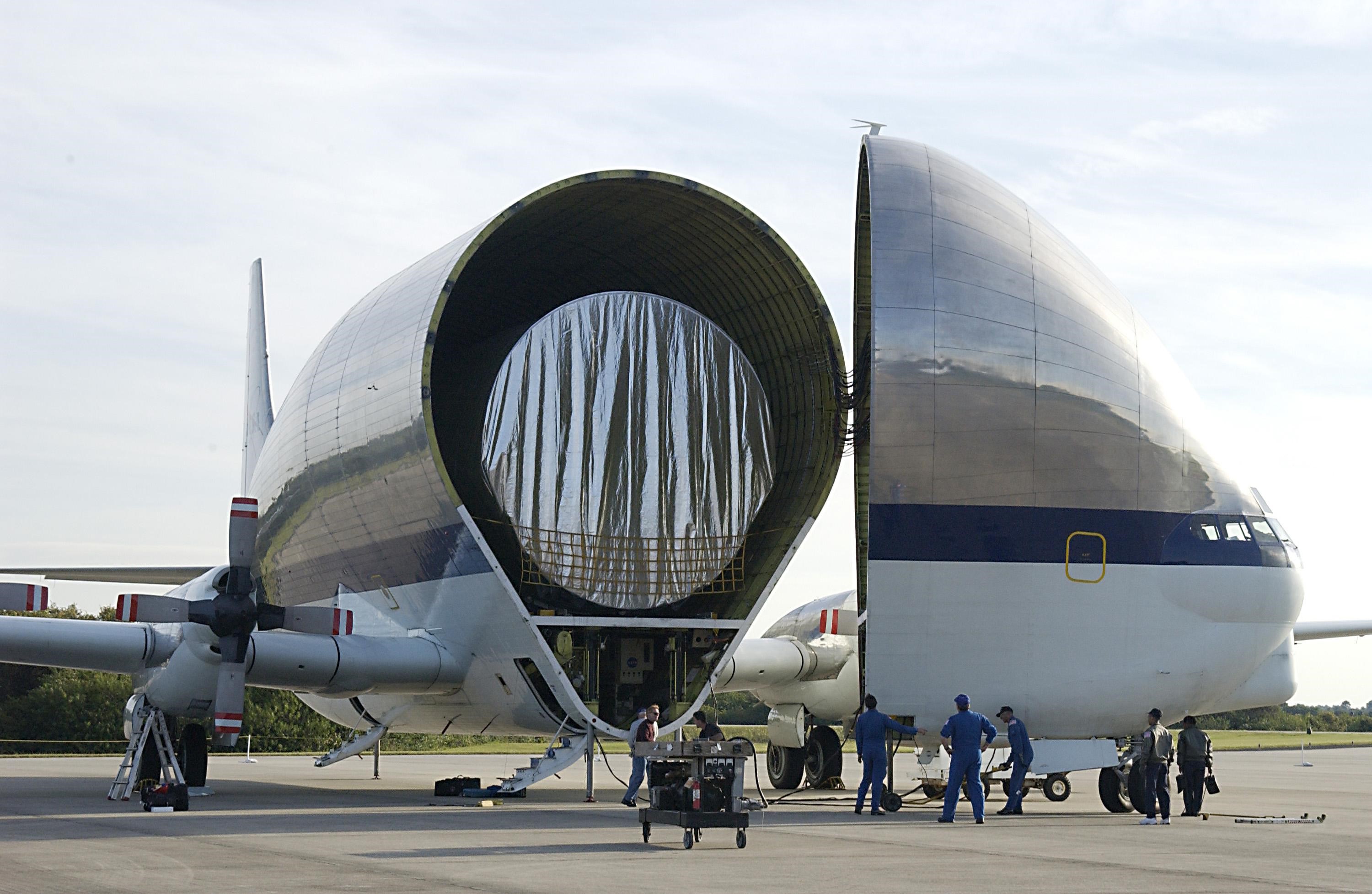 KENNEDY SPACE CENTER, FLA. -- The Integrated Equipment Assembly (IEA), one of two major components of the Starboard 6 (S6) truss segment for the International Space Station (ISS), is revealed inside NASA's Super Guppy cargo airplane following its arrival at the Shuttle Landing Facility. The customized four-engine aricraft has a 24-foot-diameter fuselage and a foldaway nose enabling it to load and transport oversize cargo. The IEA will be joined to its companion piece, the Long Spacer, before launch early in 2004. The S6 truss segment will be the 11th and final piece of the Station's Integrated Truss Structure and will support the fourth and final set of solar arrays, batteries, and electronics.