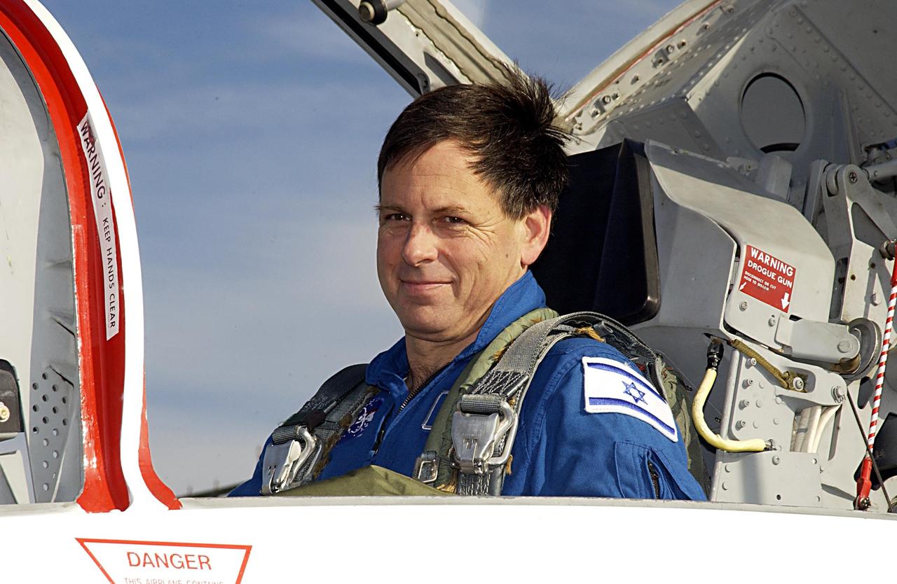 KENNEDY SPACE CENTER, FLA. - STS-107 Payload Specialist Ilan Ramon (the first Israeli astronaut) arrives at KSC to take part in Terminal Countdown Demonstration Test activities, which include a simulated launch countdown.   Other crew members are Commander Rick Husband, Pilot William "Willie" McCool, Payload Commander Michael Anderson, Mission Specialists Kalpana Chawla, David Brown and Laurel Clark.  STS-107 is a mission devoted to research and will include more than 80 experiments that will study Earth and space science, advanced technology development, and astronaut health and safety.  Launch is scheduled for Jan. 16, 2003.