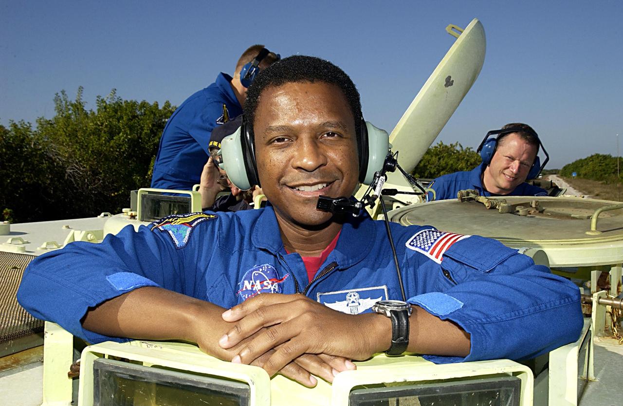 KENNEDY SPACE CENTER, FLA. --  -- STS-107 Payload Commander Michael Anderson takes a break during training on the operation of an M113 armored personnel carrier during Terminal Countdown Demonstration Test activities, a standard part of launch preparations. STS-107 is a mission devoted to research and will include more than 80 experiments that will study Earth and space science, advanced technology development, and astronaut health and safety. Launch is planned for Jan. 16, 2003, between 10 a.m. and 2 p.m. EST aboard Space Shuttle Columbia.
