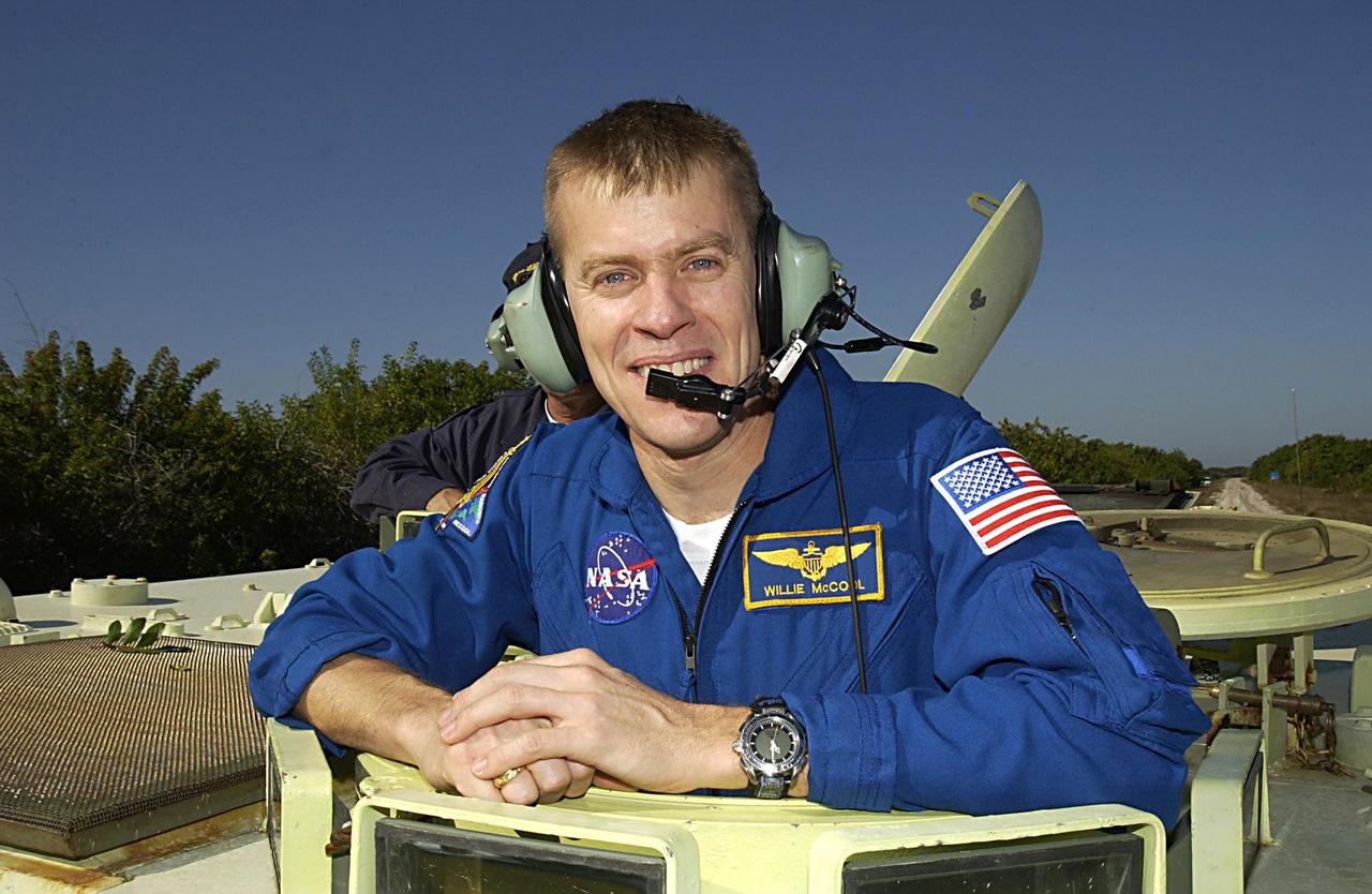 KENNEDY SPACE CENTER, FLA. --  -- STS-107 Pilot William "Willie" McCool takes a break during training on the operation of an M113 armored personnel carrier during Terminal Countdown Demonstration Test activities, a standard part of launch preparations. STS-107 is a mission devoted to research and will include more than 80 experiments that will study Earth and space science, advanced technology development, and astronaut health and safety. Launch is planned for Jan. 16, 2003, between 10 a.m. and 2 p.m. EST aboard Space Shuttle Columbia.