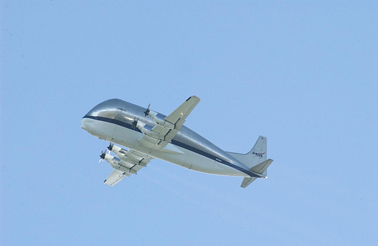 KENNEDY SPACE CENTER, FLA. - NASA's Super Guppy cargo airplane arrives at KSC carrying the Long Spacer (LS), the second and final piece of the Starboard 6 (S6) Integrated Truss Segment. After landing and offloading, the LS will be transported to the Space Station Processing Facility for inspections and verification tests. Eventually the LS will be integrated with the S6 Integrated Equipment Assembly already at KSC and will fly as one segment to the International Space Station on Space Shuttle mission STS-119 in early 2004. Together the segment pieces weigh 26,000 pounds and measure 45 feet long.