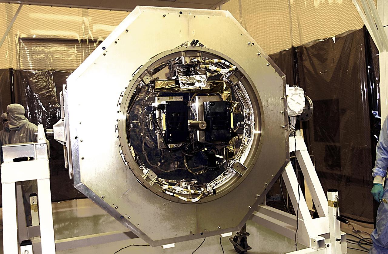 KENNEDY SPACE CENTER, FLA. -  Another view of the SORCE satellite ready for mating to the Pegasus launch vehicle. SORCE is equipped with four instruments that will measure variations in solar radiation and observe some spectral properties of solar radiation for the first time. With data from NASA's SORCE mission, researchers should be able to follow how the Sun affects our climate now and in the future.  Launch of SORCE aboard the Pegasus XL rocket is scheduled for Jan. 25, 2003, at approximately 3:14 p.m. EST, from Cape Canaveral Air Force Station, Fla.