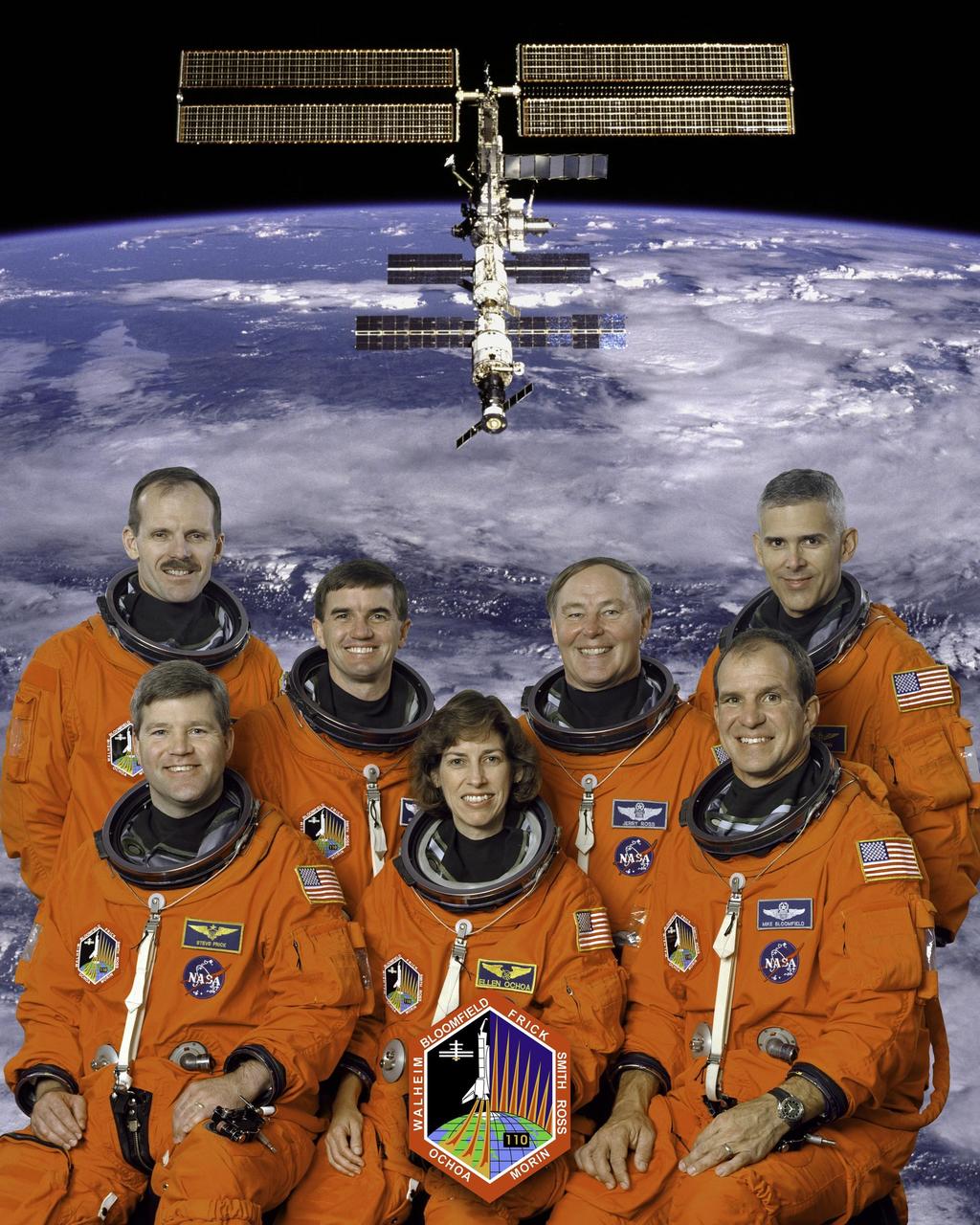 JOHNSON SPACE CENTER, HOUSTON, TEXAS. --  STS-110 CREW PORTRAIT -- (JSC STS110-5-002) -- These seven astronauts are in training for the STS-110 mission, scheduled to visit the International Space Station early next year.  In front, from the left, are astronauts Stephen N. Frick, pilot; Ellen Ochoa, flight engineer; and Michael J. Bloomfield, mission commander; in the back, from left, are astronauts Steven L. Smith, Rex J. Walheim, Jerry L. Ross and Lee M.E. Morin, all mission specialists