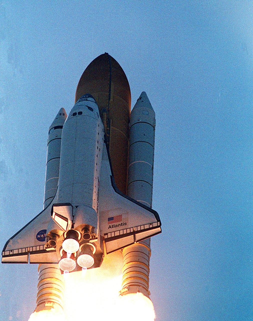 KENNEDY SPACE CENTER, FLA. - Space Shuttle Atlantis roars into the clear blue sky as it launches on mission STS-110. Liftoff occurred at 4:44:19 p.m. EDT (20:41:19 GMT).  Carrying the S0 Integrated Truss Structure and Mobile Transporter, STS-110 is the 13th assembly flight to the International Space Station
