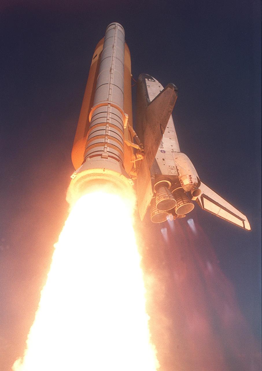 KENNEDY SPACE CENTER, FLA. -- Space Shuttle Atlantis roars into the clear blue sky as it launches on mission STS-110. Liftoff occurred at 4:44:19 p.m. EDT (20:41:19 GMT).  Carrying the S0 Integrated Truss Structure and Mobile Transporter, STS-110 is the 13th assembly flight to the International Space Statio