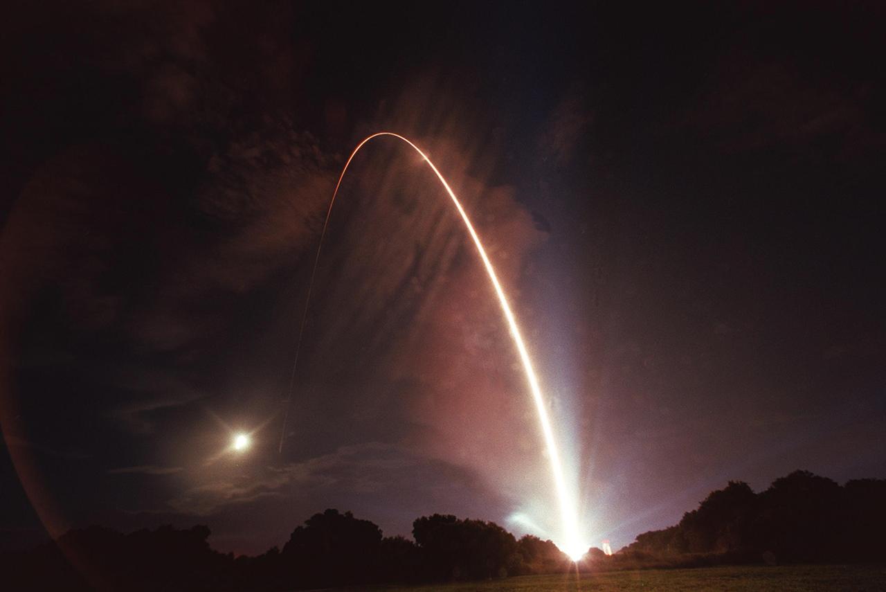 KENNEDY SPACE CENTER, FLA. -- The Boeing Delta II rocket carrying NASA's Comet Nucleus Tour (CONTOUR) spacecraft streaks across the night sky above pad 17-A, Cape Canaveral Air Force Station. The launch took place at 2:47:41 a.m. EDT July 3. Designed and built by The Johns Hopkins University Applied Physics Laboratory (APL) in Laurel, Md., the 2,138-pound (970-kilogram) spacecraft will be placed into an elliptical Earth orbit until Aug. 15, when it is scheduled to fire its main engine and enter a comet-chasing orbit around the sun. The mission's flexible four-year plan includes encounters with comets Encke (Nov. 12, 2003) and Schwassmann-Wachmann 3 (June 19, 2006), though it can add an encounter with a "new" and scientifically valuable comet from the outer solar system, should one be discovered in time for CONTOUR to fly past it. CONTOUR's four scientific instruments will take detailed pictures and measure the chemical makeup of each comet's nucleus -- a chunk of ice and rock -- while analyzing the surrounding gas and dust.